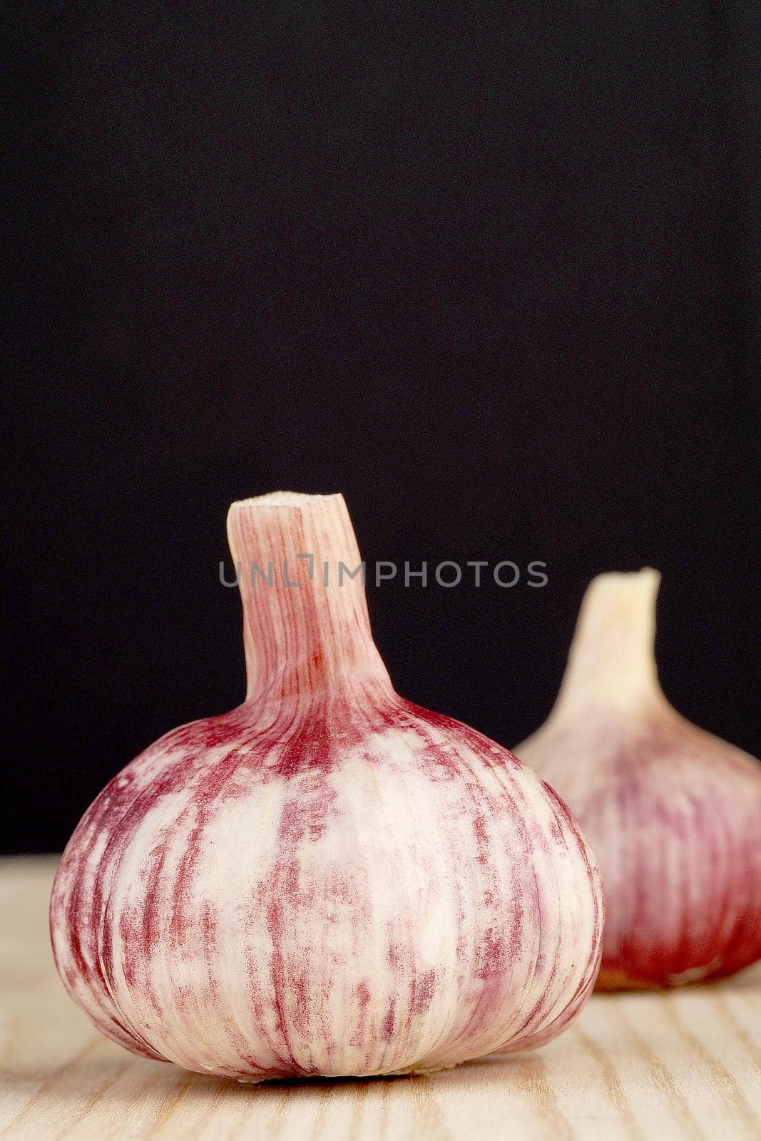 Fresh young garlic, isolated, close-up. Head of garlic. by Olga26