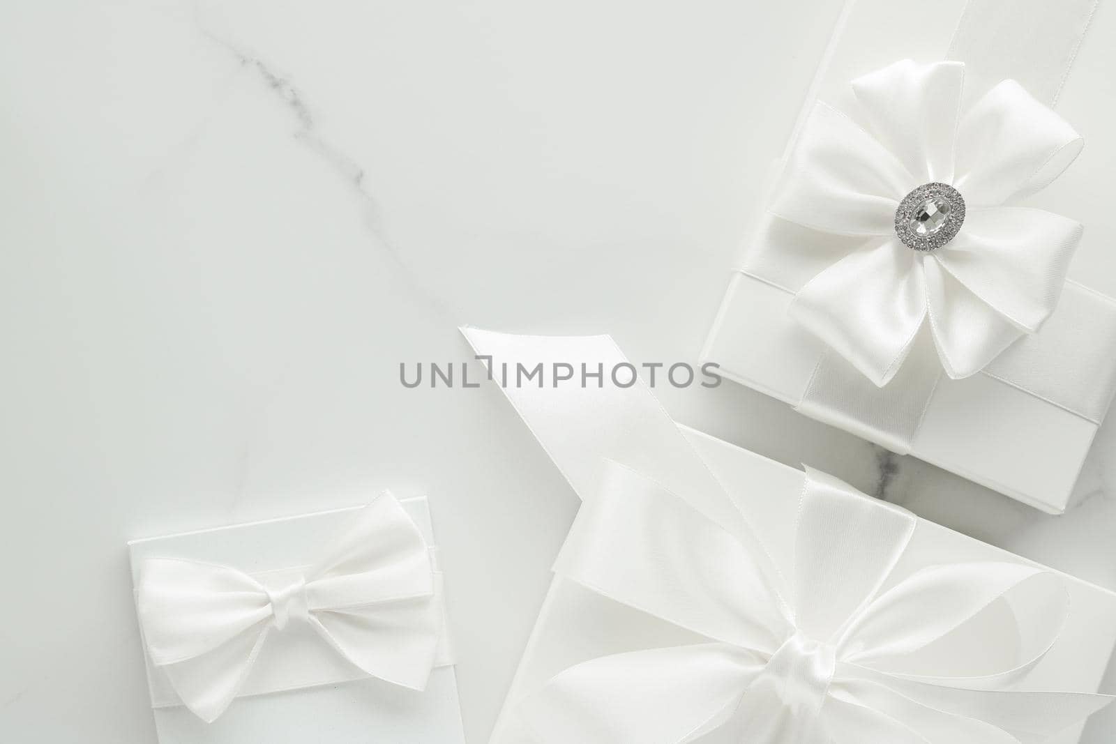 Romantic celebration, lifestyle and holiday present concept - Luxury wedding gifts on marble