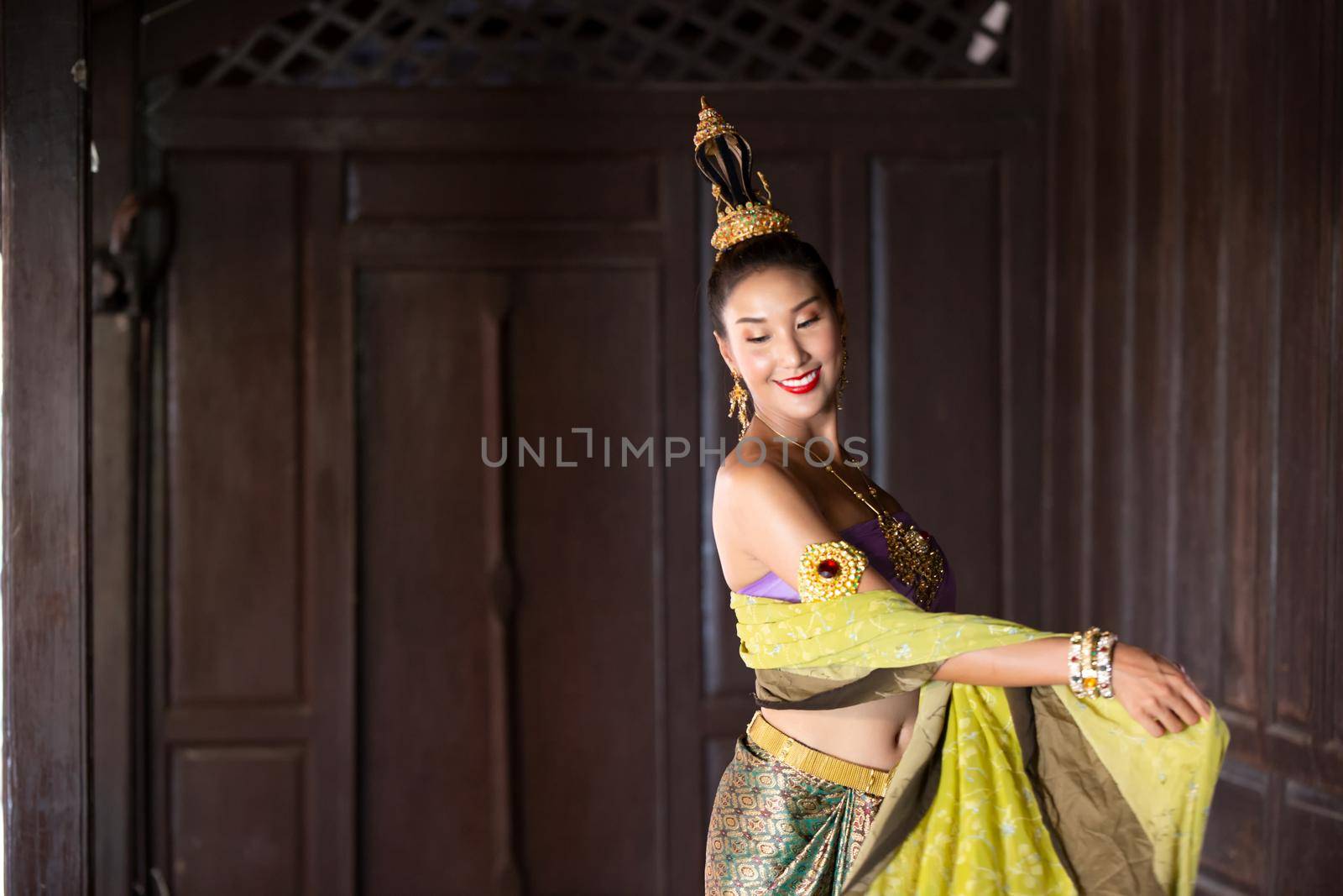 Beautiful woman, Thai national costume, traditional Thai dress, Thai woman, good mood, beautiful smile background - Image with noise and grain