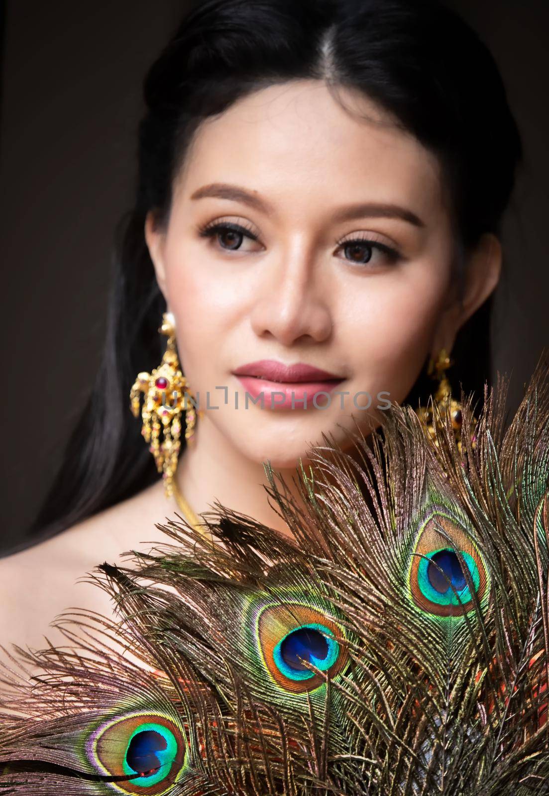 Beautiful woman, Thai national costume, traditional Thai dress, Thai woman, good mood, beautiful smile background - Image with noise and grain