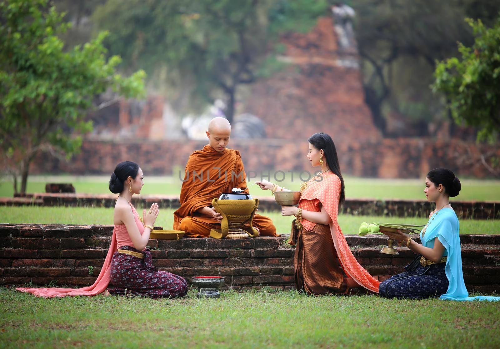 Buddhist monks at Wat Mahathat temple, Sukhothai by chuanchai