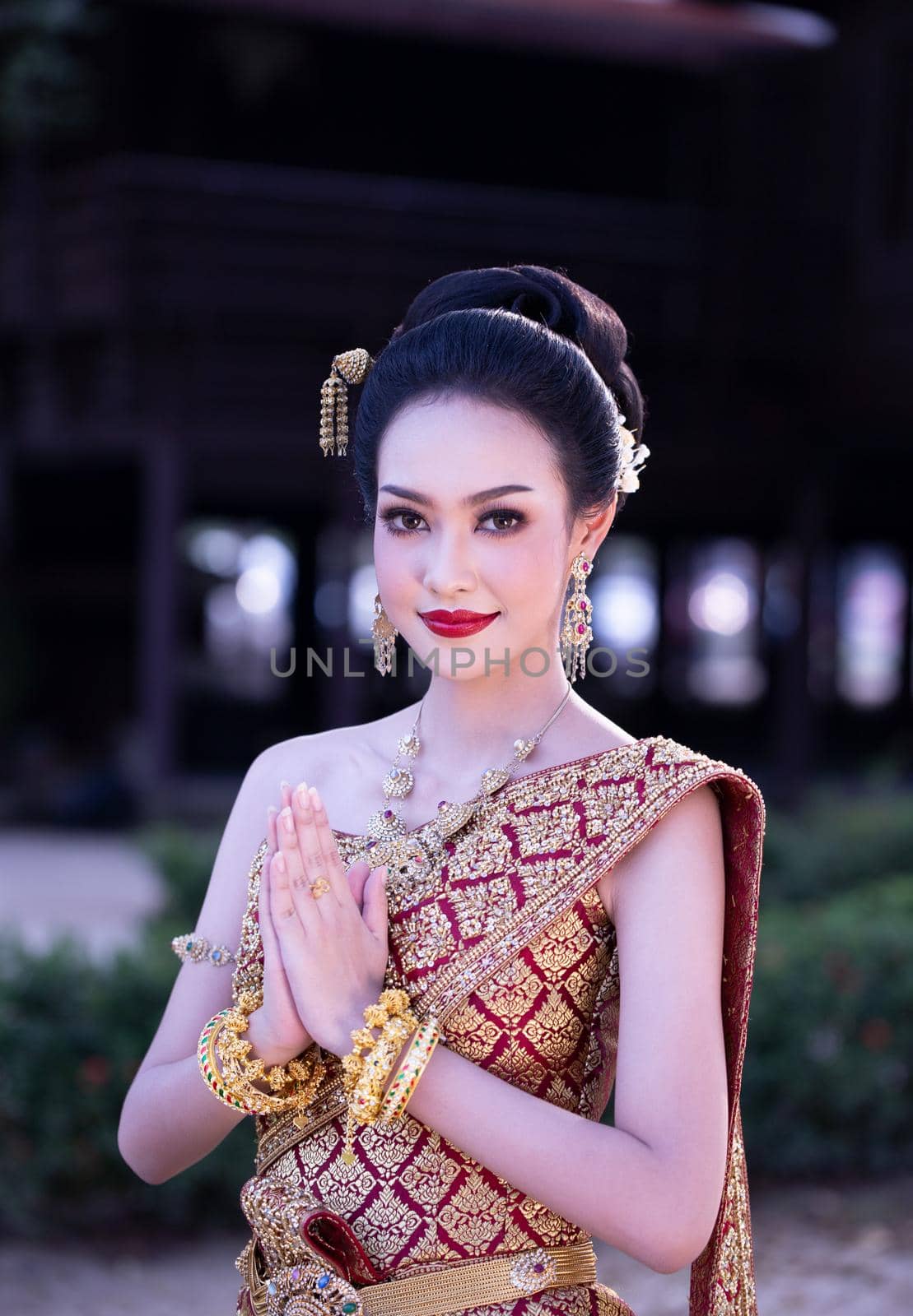 Beautiful woman, Thai national costume, traditional Thai dress, Thai woman, good mood, beautiful smile background - Image with noise and grain by chuanchai