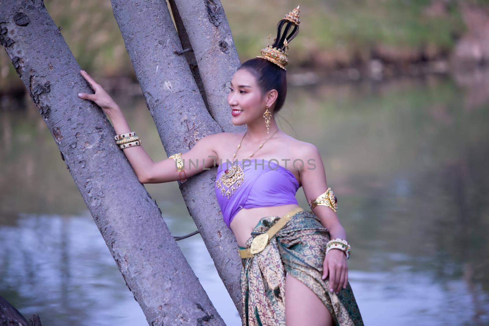 Beautiful woman, Thai national costume, traditional Thai dress, Thai woman, good mood, beautiful smile background - Image with noise and grain