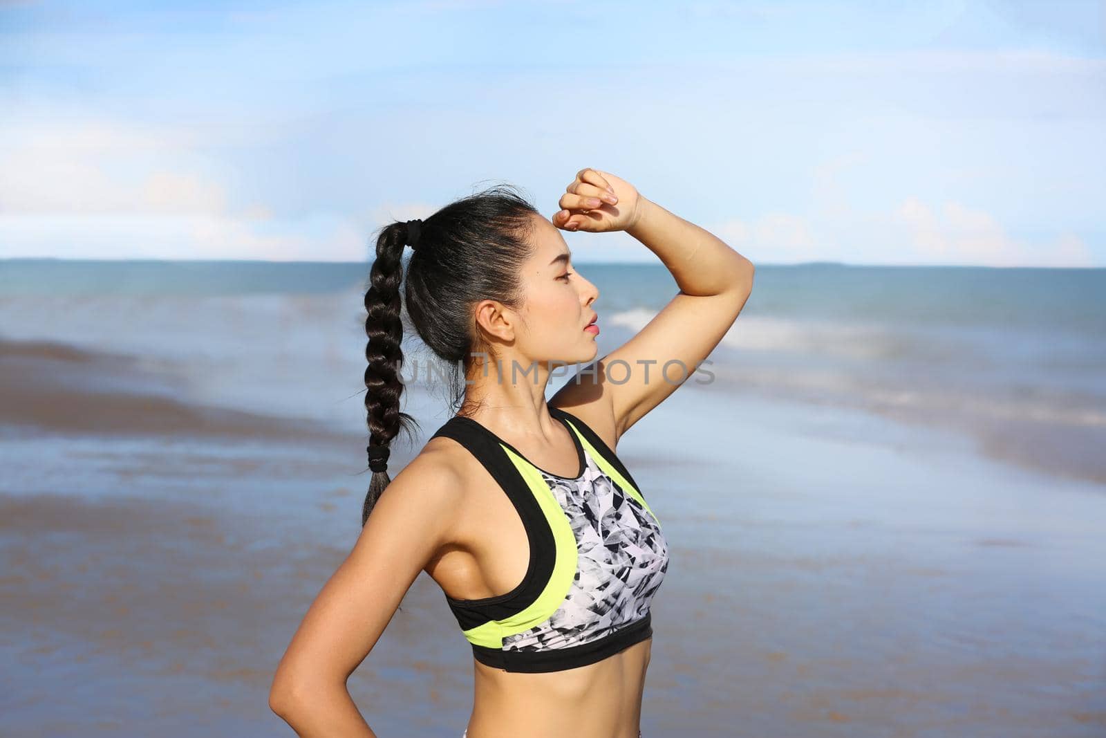 beautiful young woman doing sports and excercise.  by chuanchai