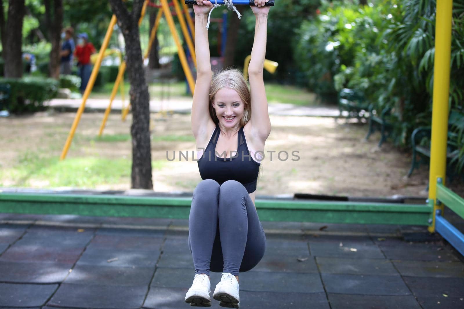 beautiful young woman doing sports and excercise.  by chuanchai