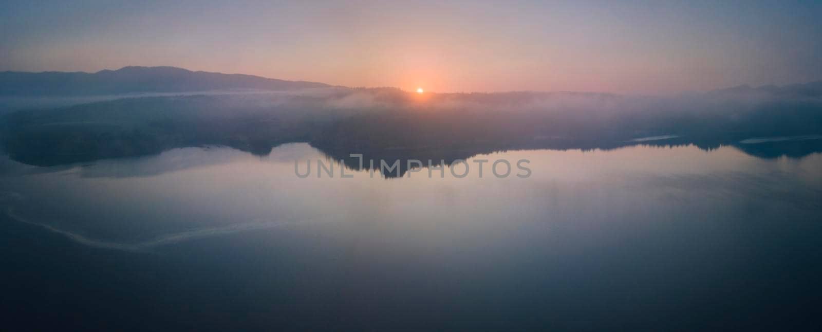 Panorama of Czorsztyn Lake at sunrise. Czorsztyn, Lesser Poland, Poland.