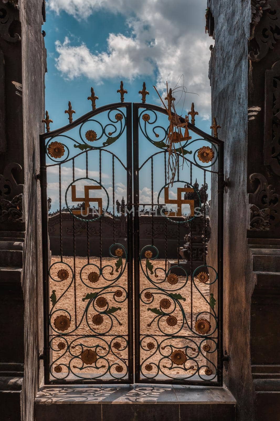 iron gate decorated with swastika symbols, Bali Indonesia by artush