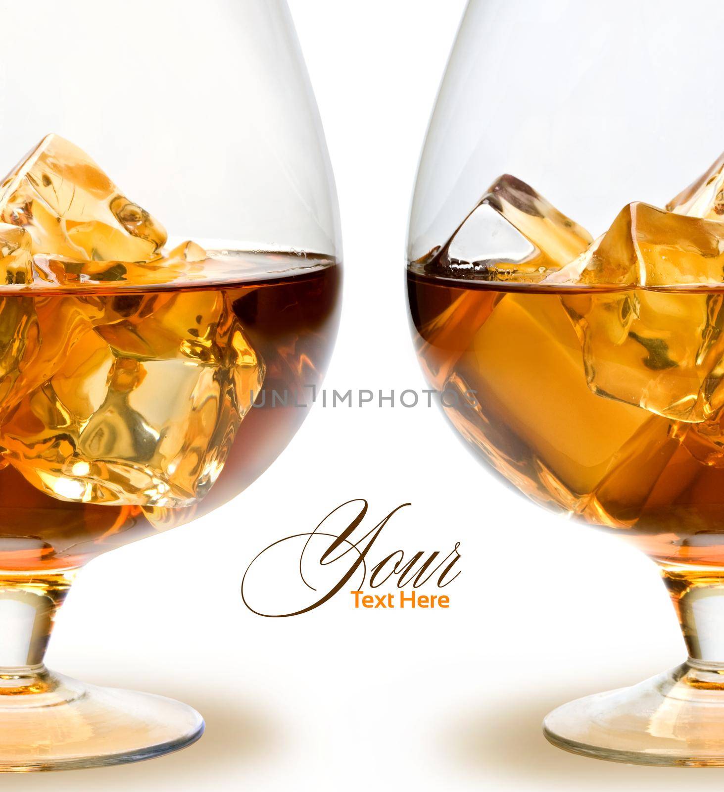 Glass of Whiskey with ice on white background