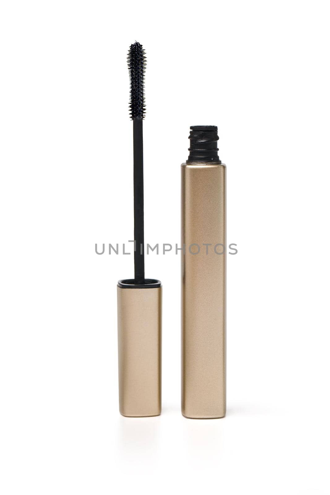 Black mascara wand and tube on white background