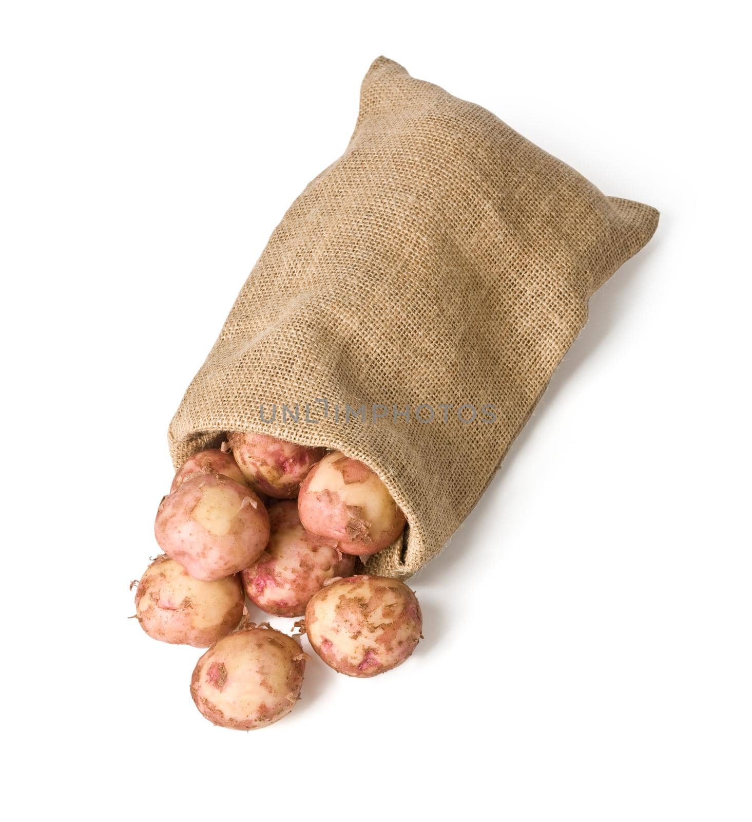 potatoes in burlap sack on white background with clipping path