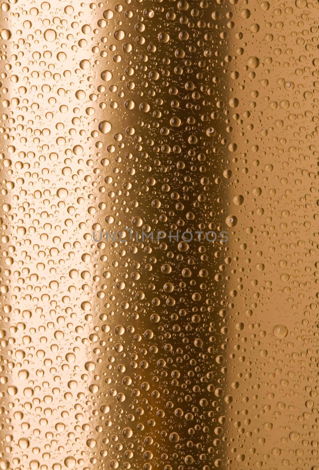 Abstract macro of water drops over yellow background