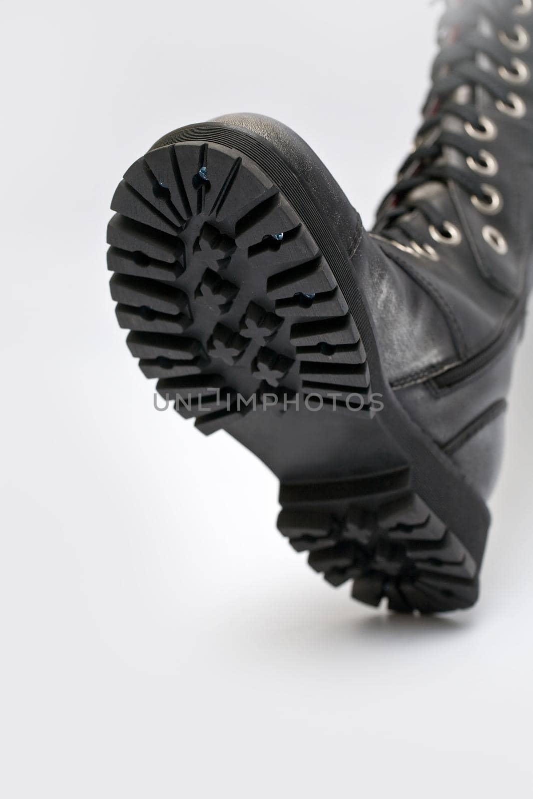 Black boot on a white background.