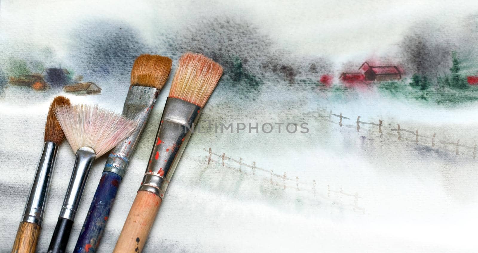 Paintbrush on painted background. by kornienko