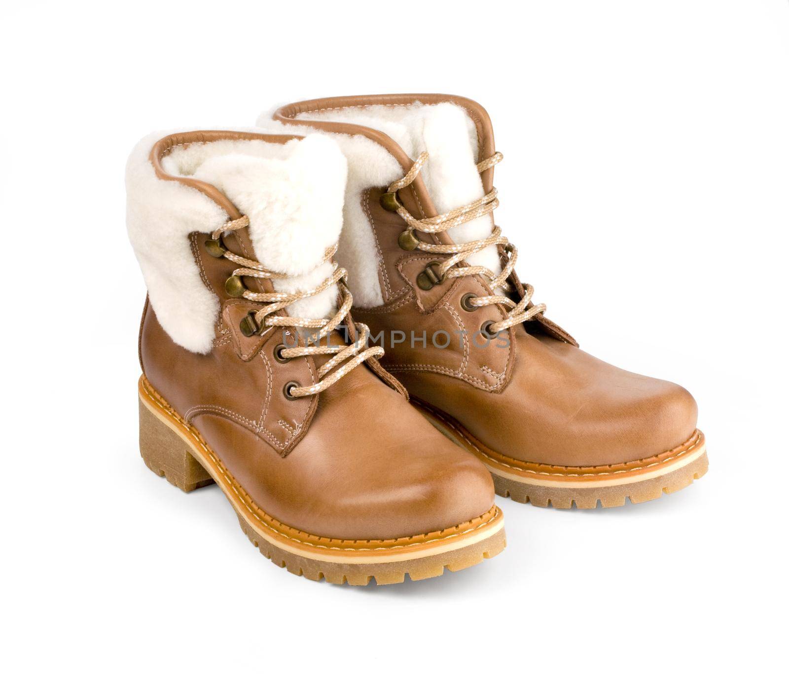 Winter female boots with fur over white . With clipping path