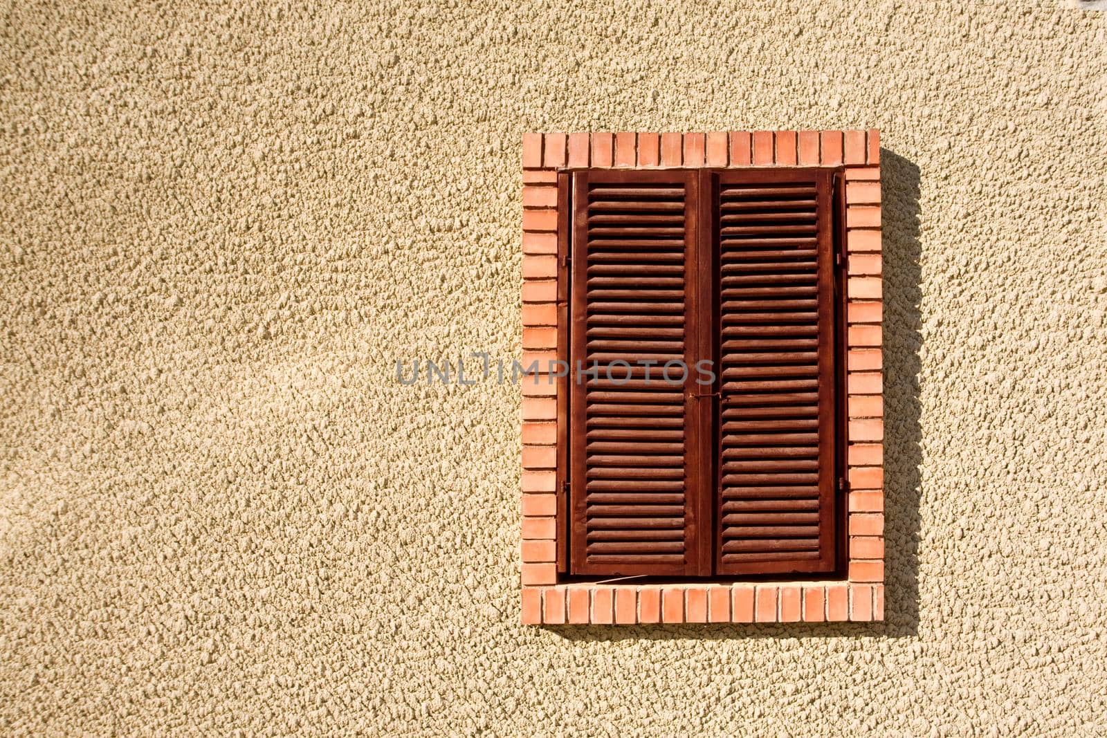 Closed old wooden window shutters