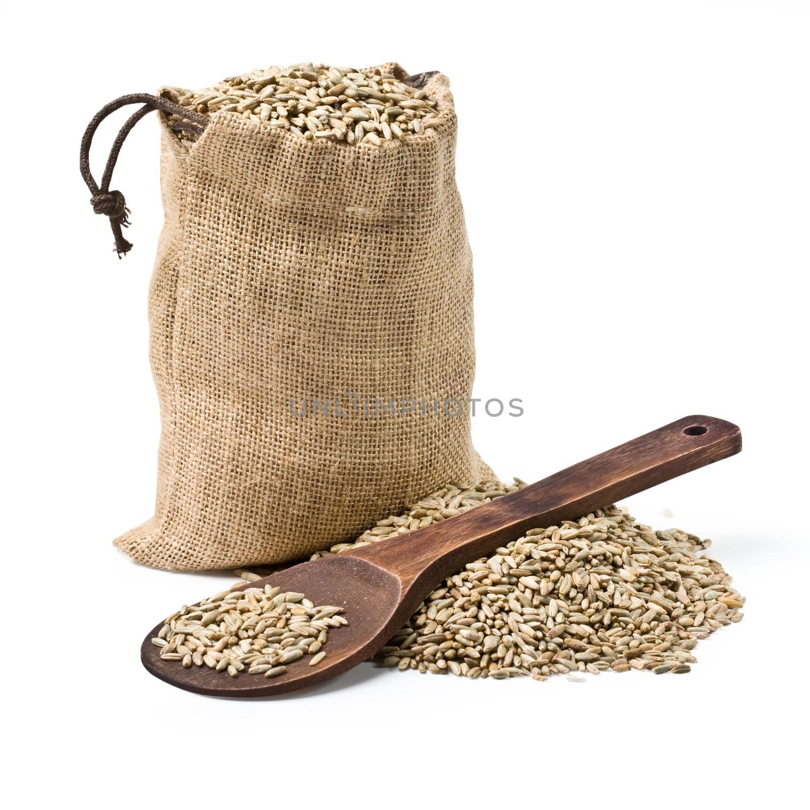 bag of rye and a wooden spoon on a white background. keeping paths