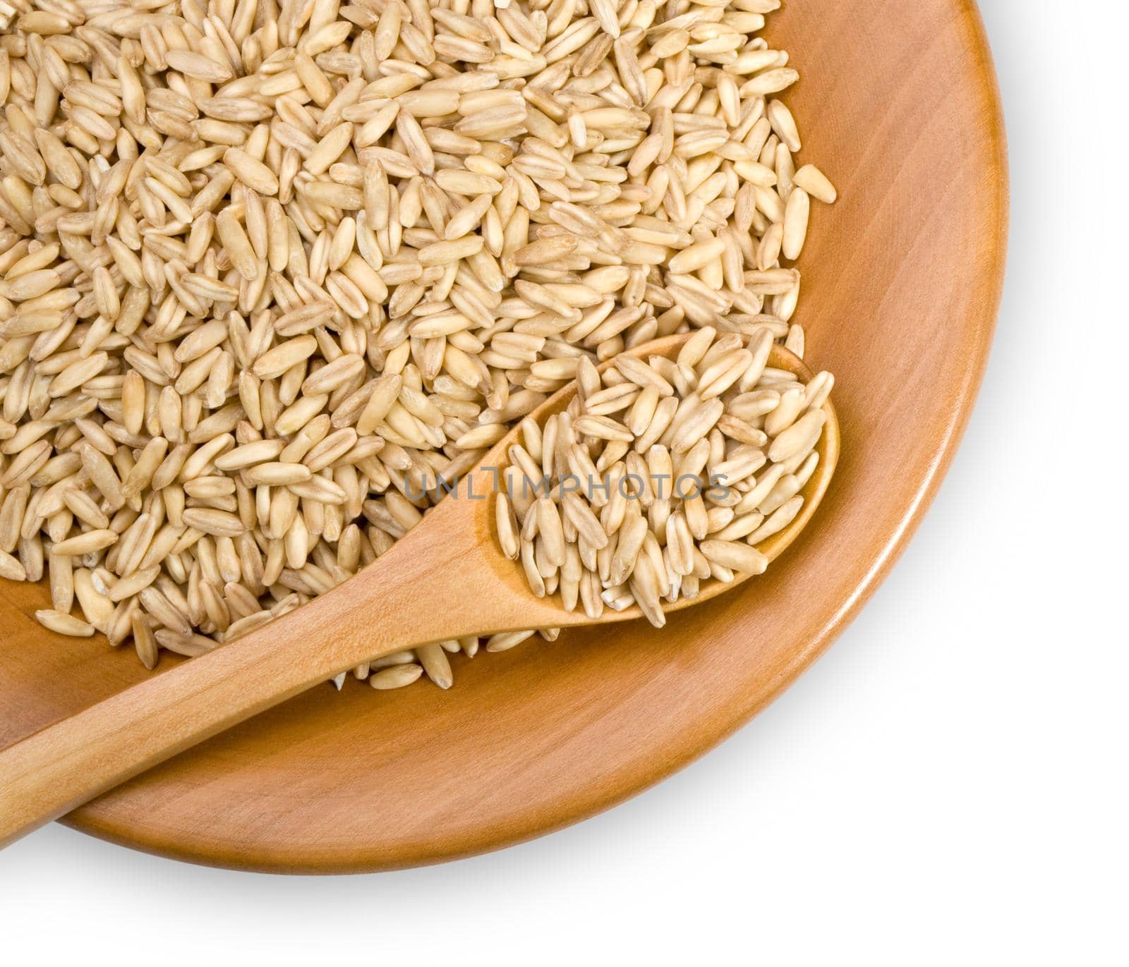 wooden plate with grains of  rye, close-up