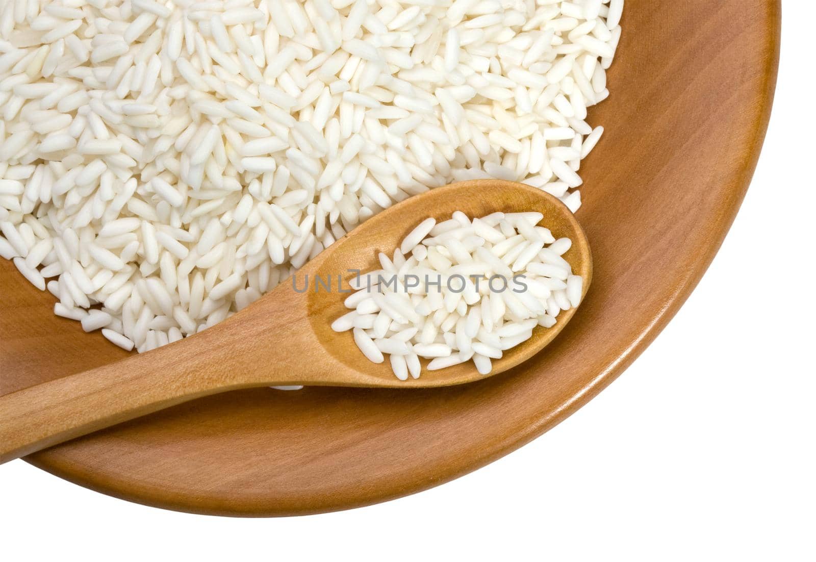 wooden plate with grains of rice  by kornienko