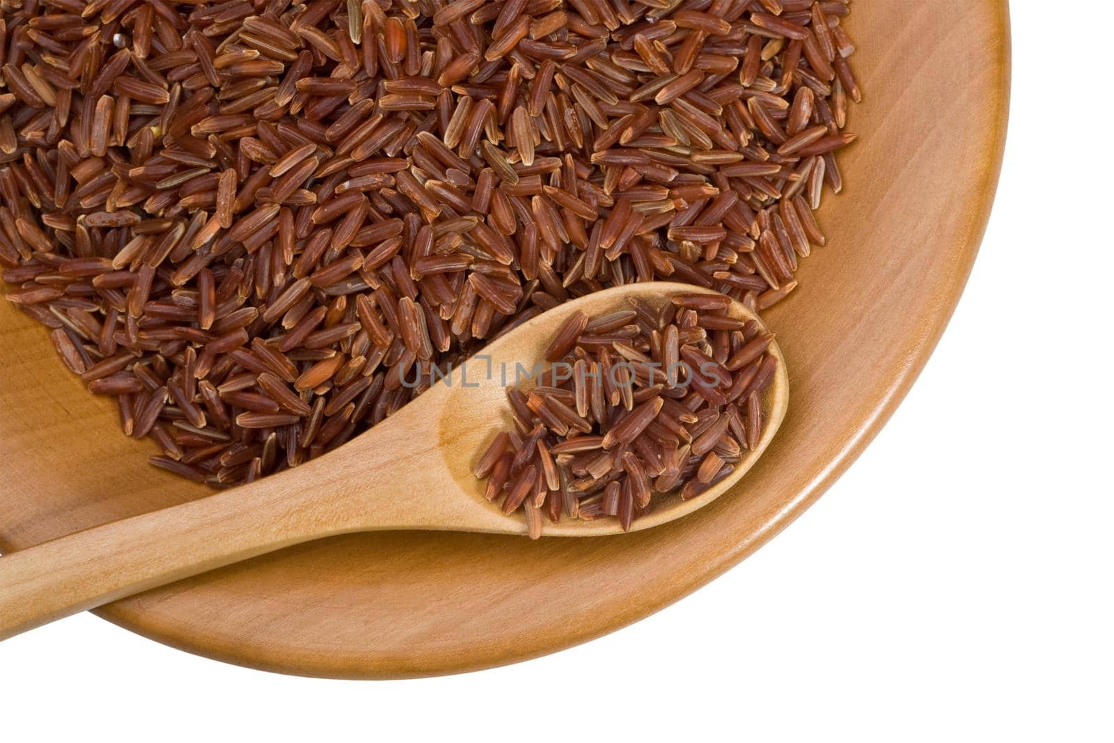 wooden plate with grains of rice on a white background with clipping paths