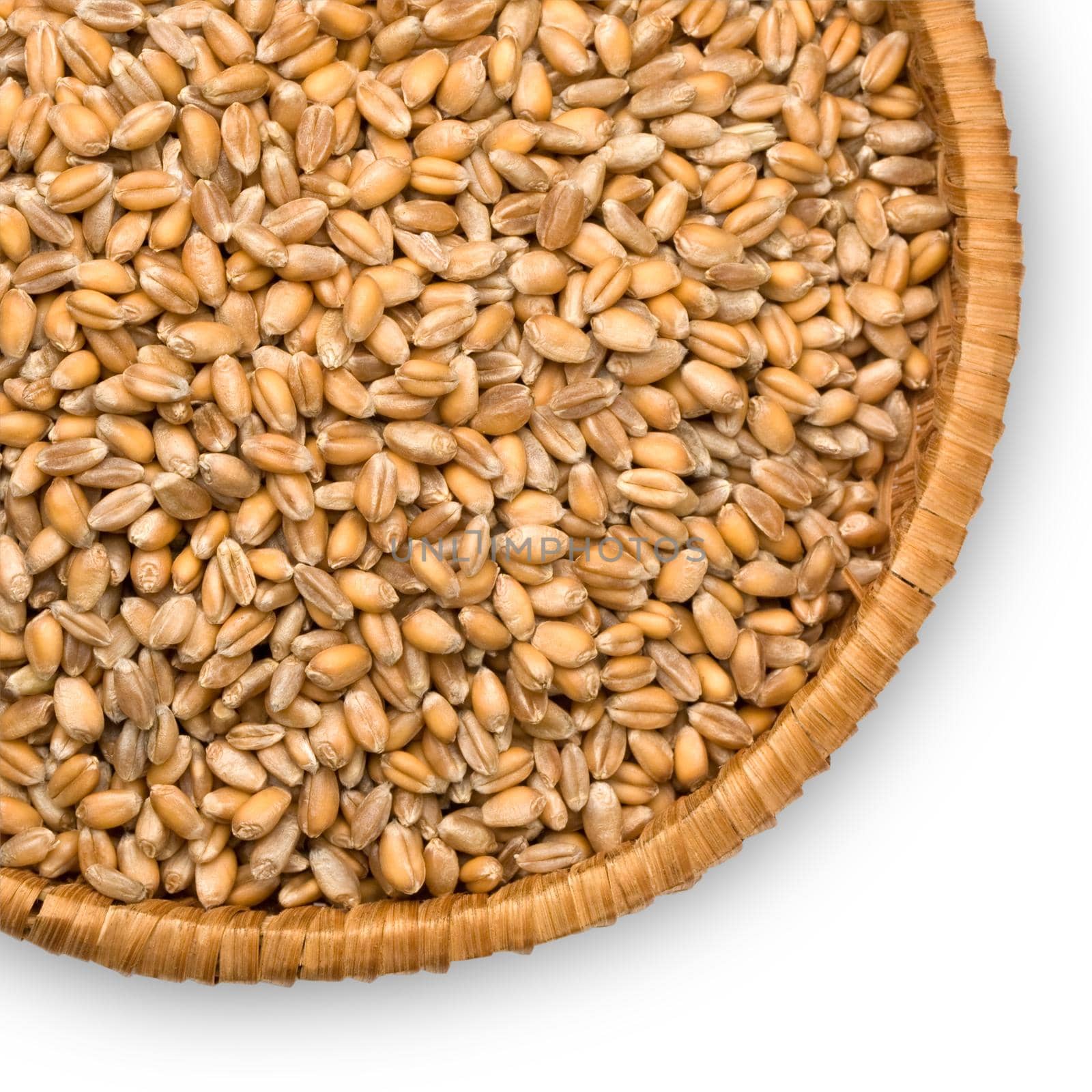 wheat  close-up on a plate of straw isolated on white background