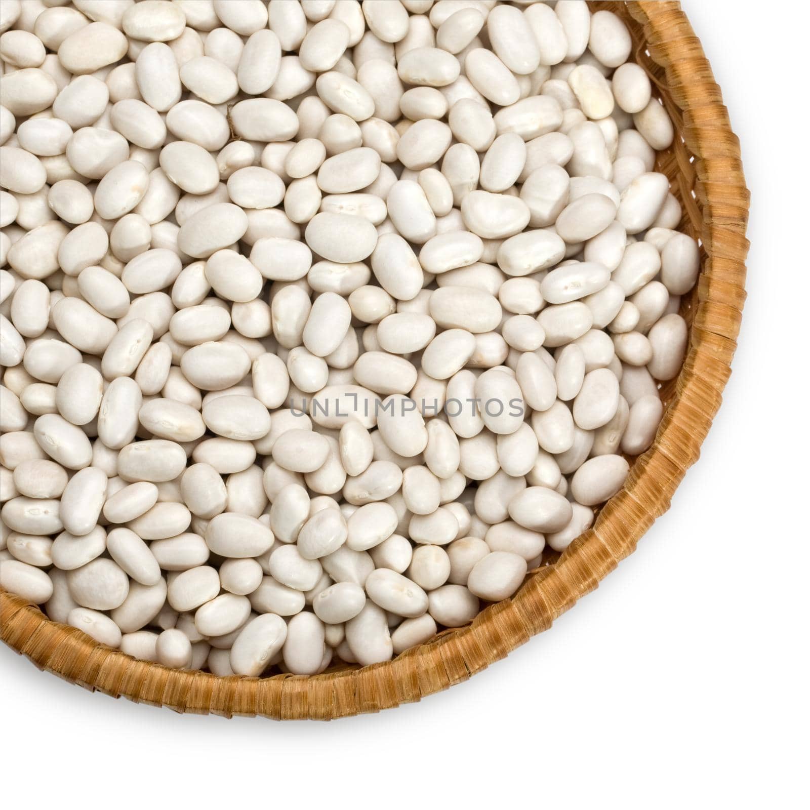 Wicker plate with grains beans close-up on white background