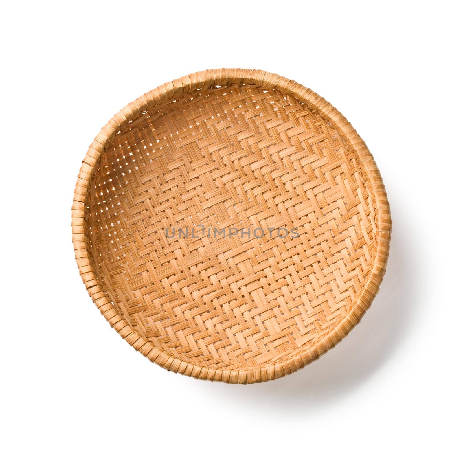 Dish of straw isolated on white background