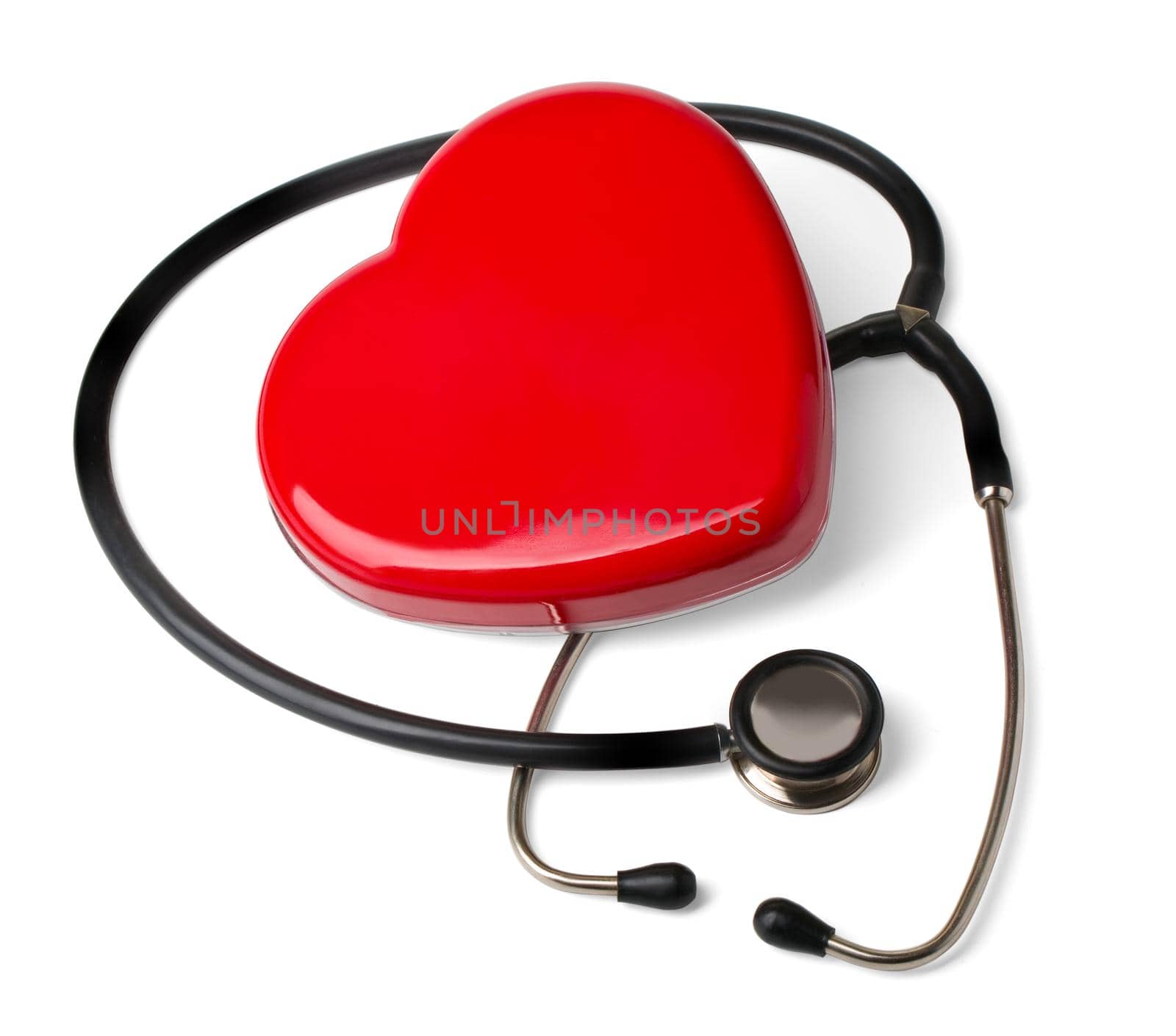 Medical stethoscope and heart isolated on white