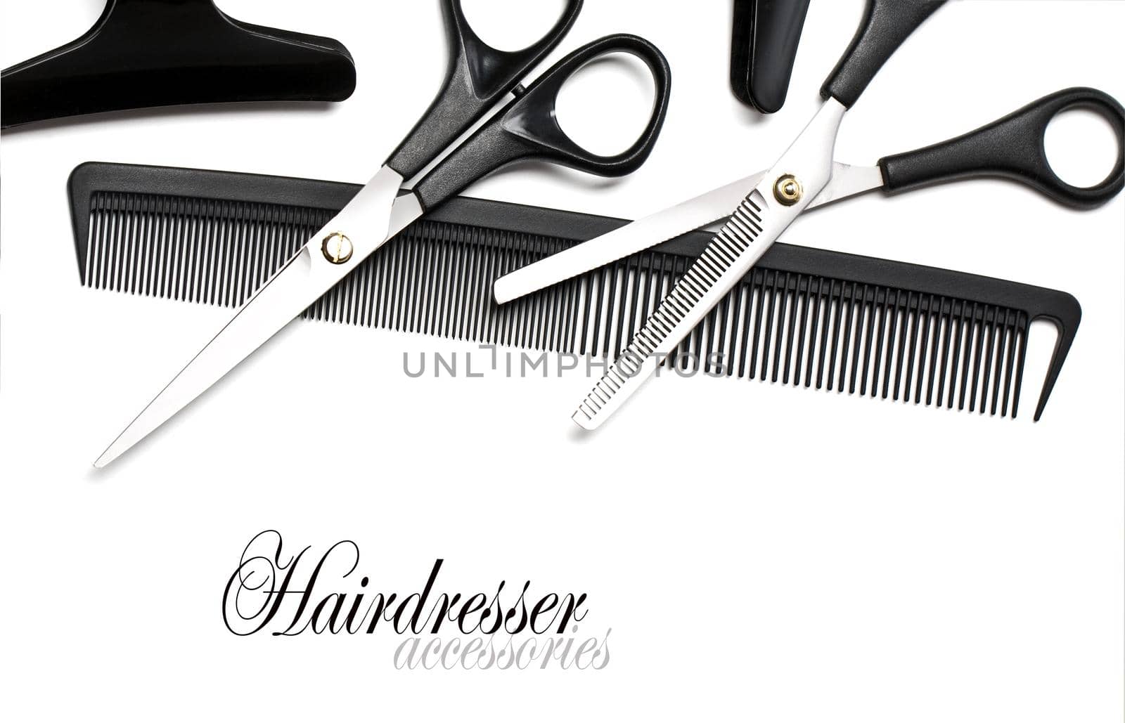 Scissors and Comb for hair isolated on white