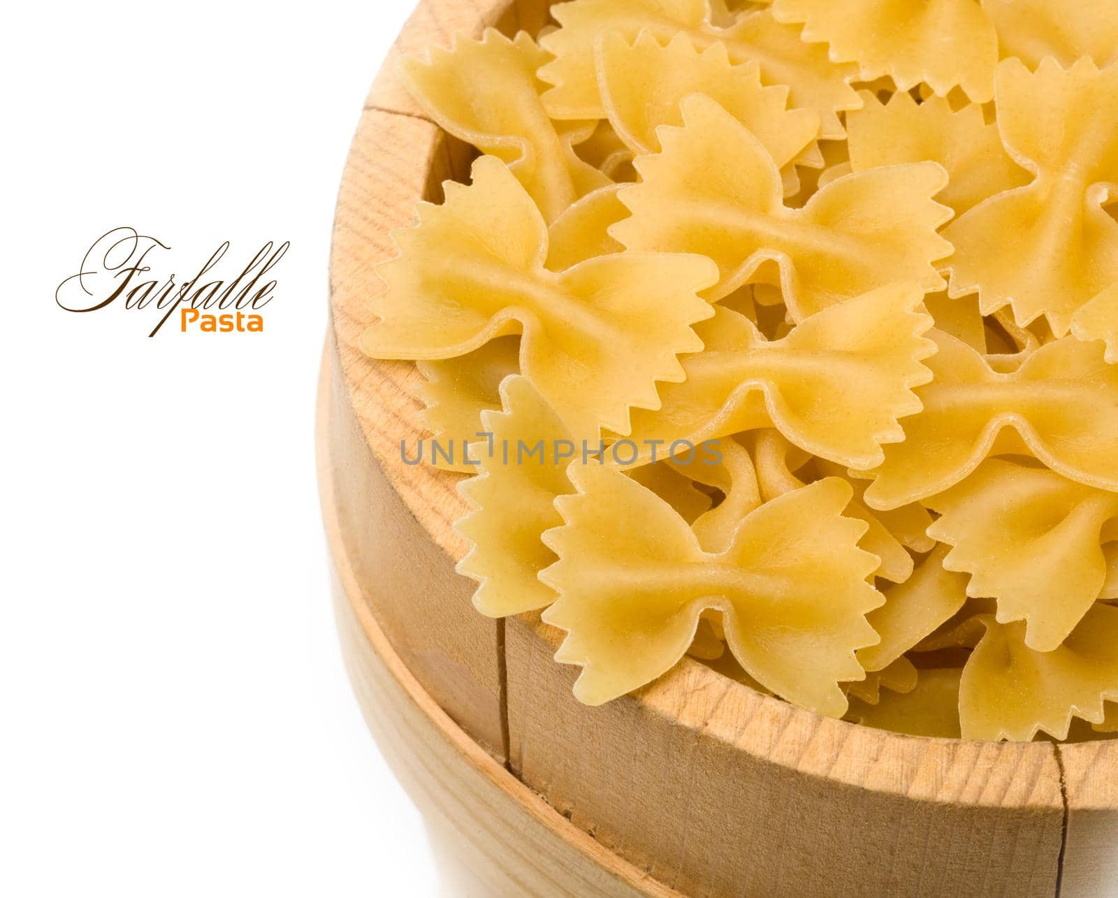 Close-up pasta in a wooden bowl with copy  space 