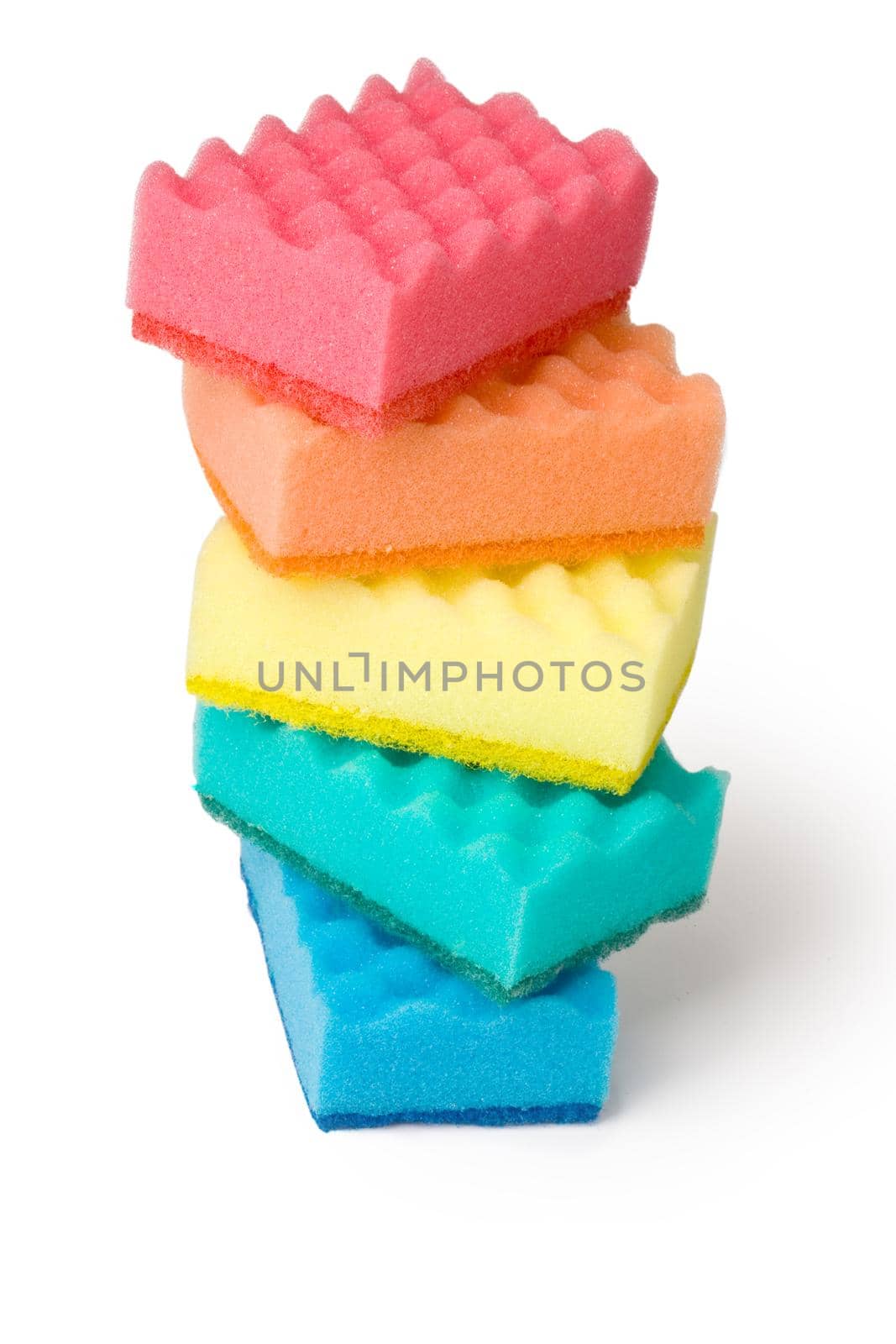 Stack of cleaning sponges on a white background.
