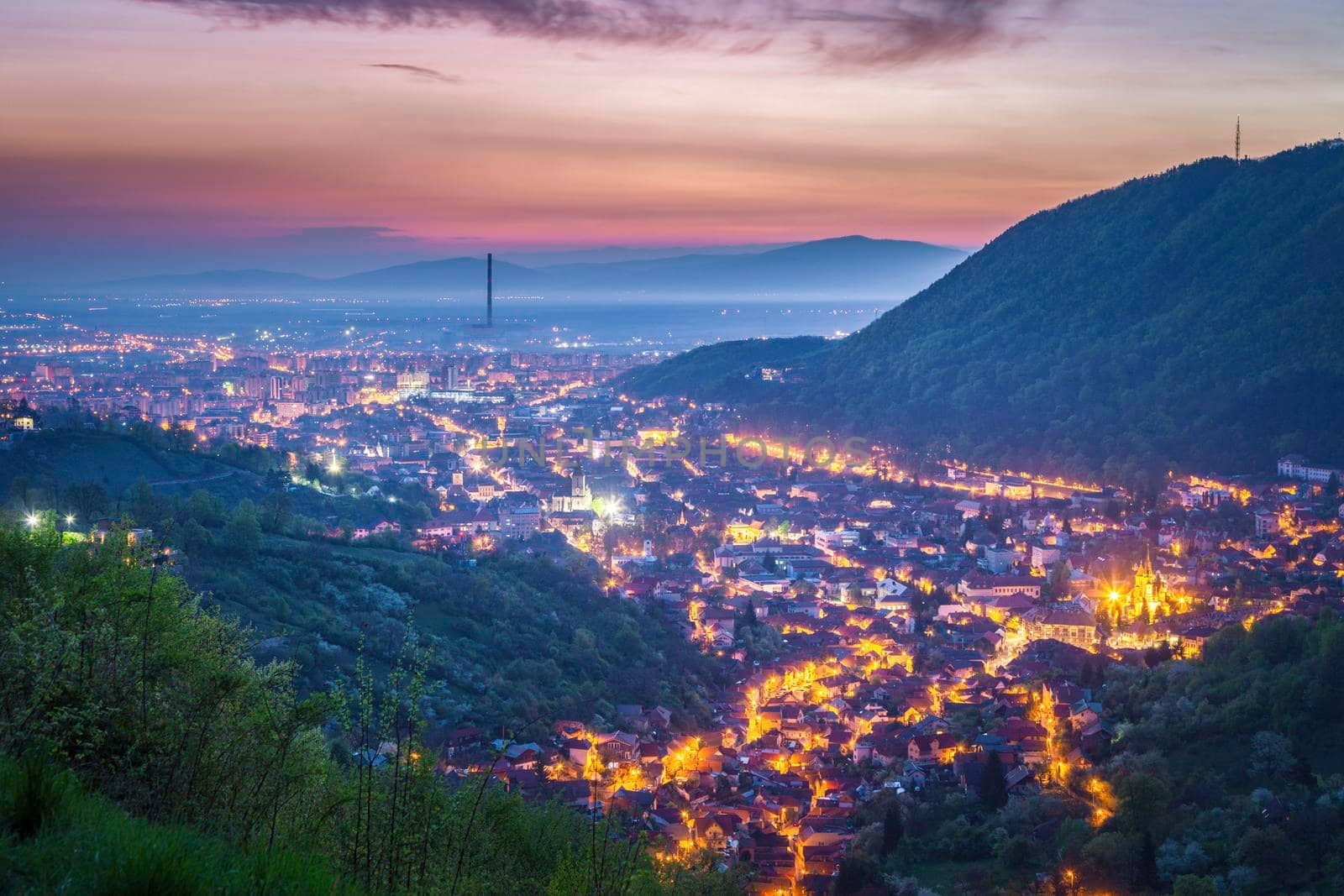 Aerial panorama of Brasov at dawn. Brasov, Brasov County, Romania.