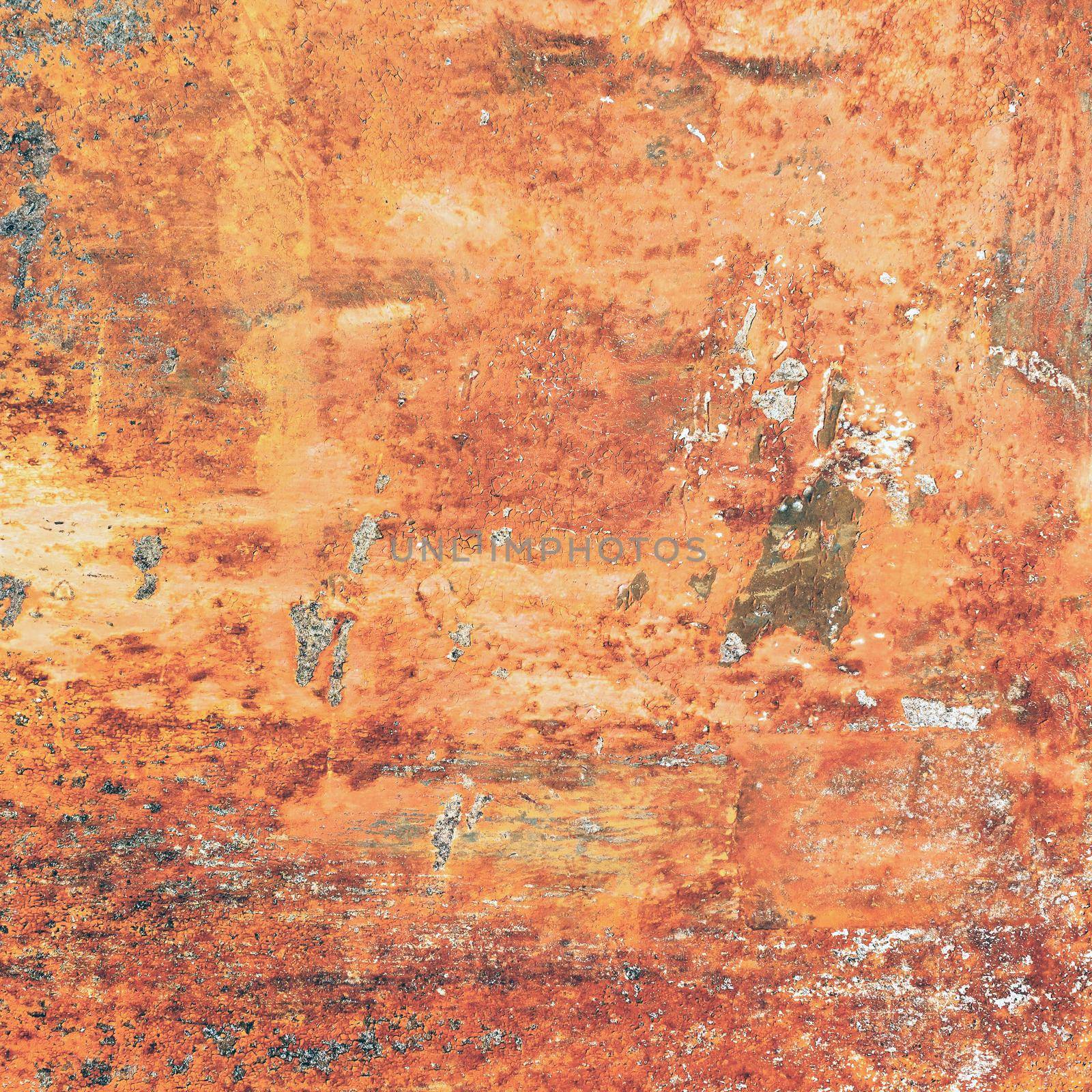 Rust metal background. Grunge orange panel with oxidized or rusty marks produce a colorful painted surface that is full of texture and patterns.