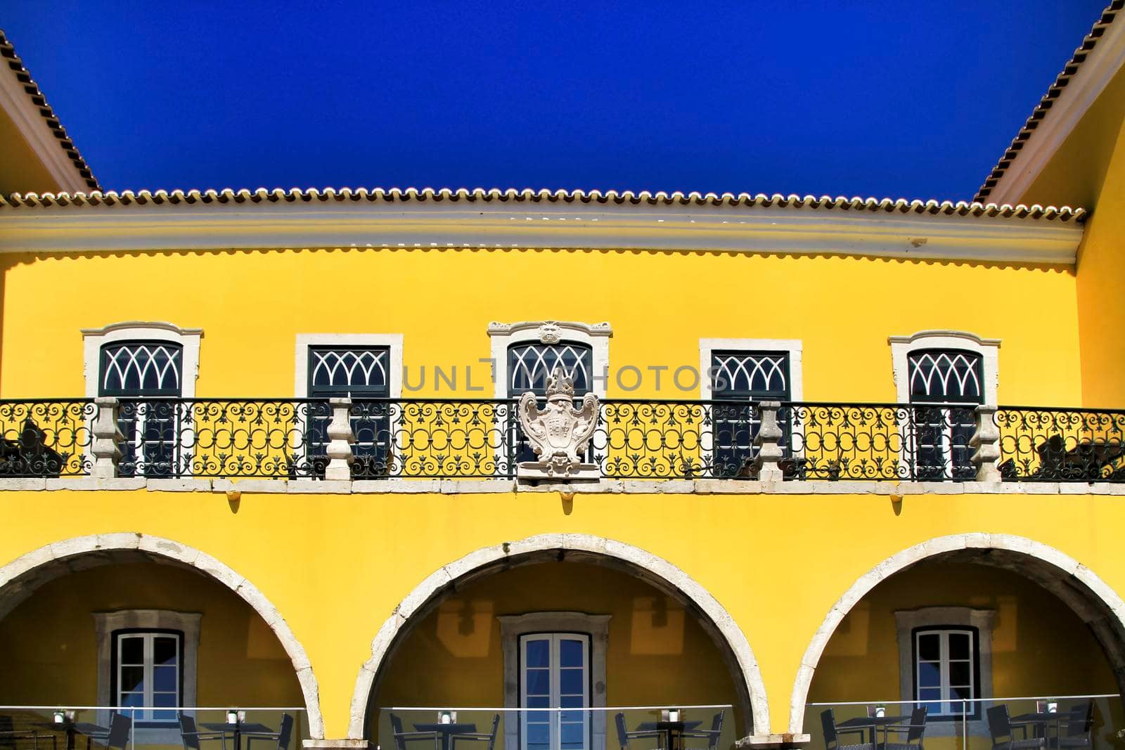 Narrow and colorful streets, majestic facades, windows and balconies of Lisbon, Portugal