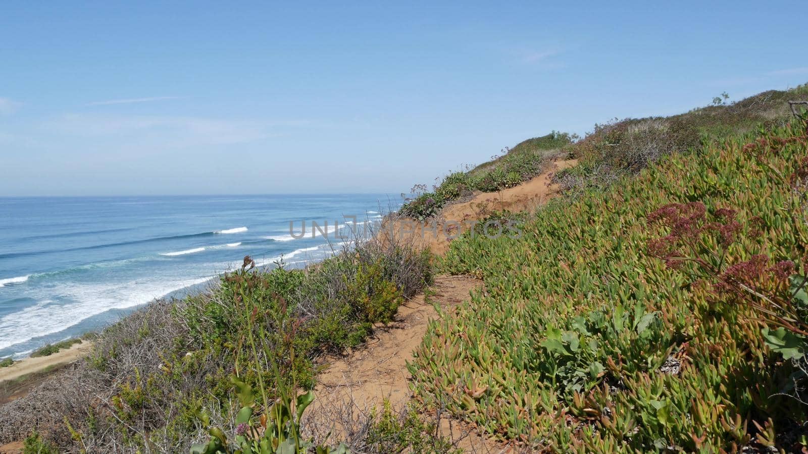 Seascape vista point, viewpoint in Del Mar near Torrey Pines, California coast USA. Frome above panoramic ocean tide, blue sea waves, steep eroded cliff. Coastline overlook, shoreline high angle view