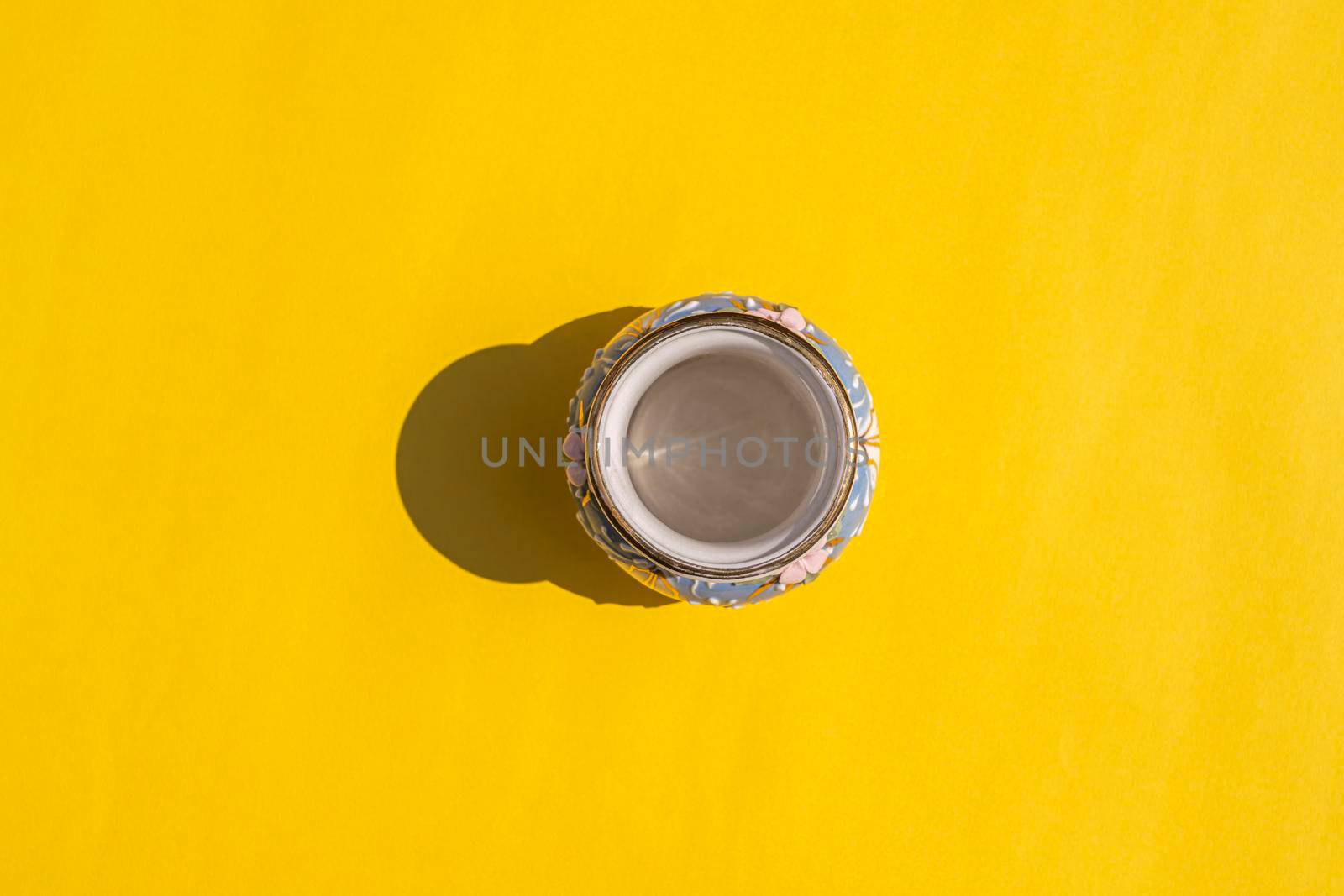 vase with a hard shadow on a colored background. High quality photo