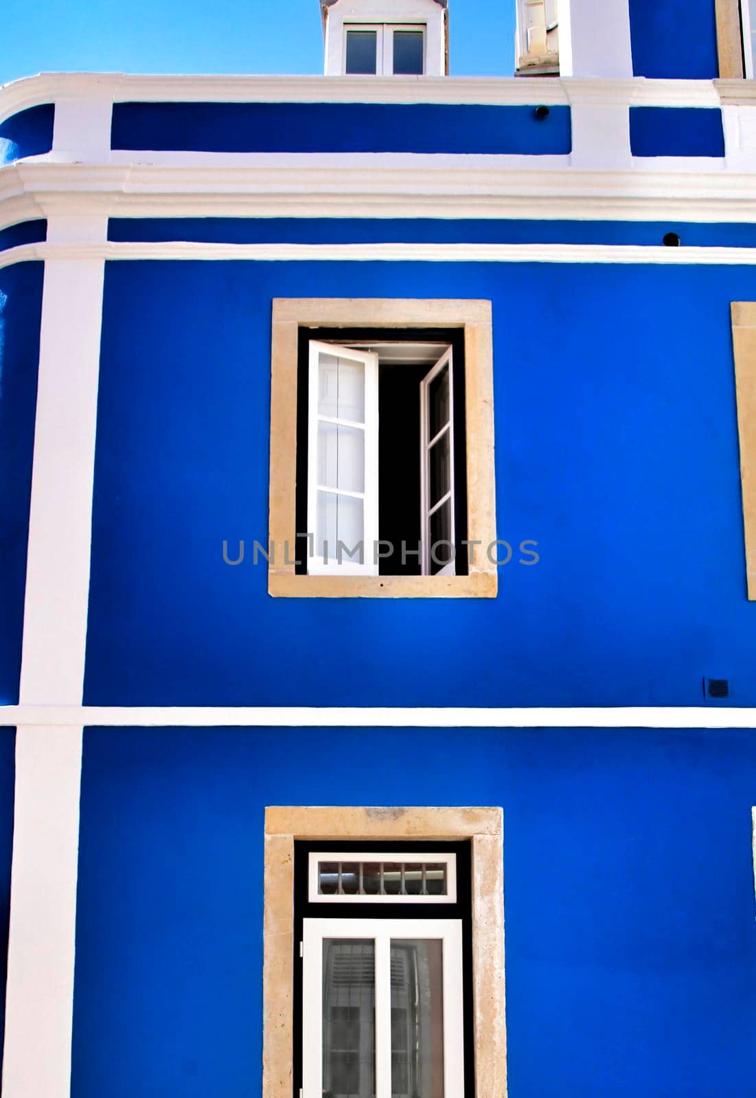 Narrow and colorful streets, majestic facades, windows and balconies of Lisbon, Portugal