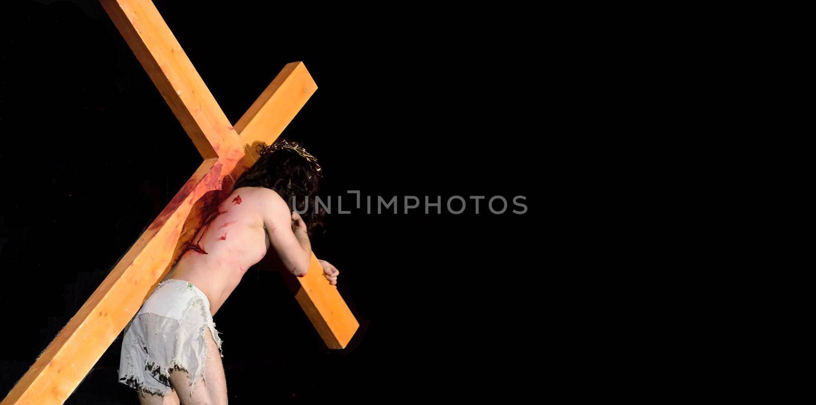 Jesus carrying the Cross into the darkness. by andre_dechapelle