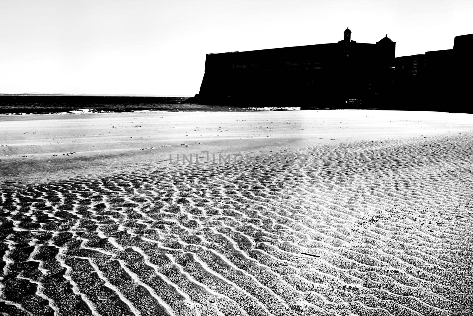 Beautiful beach called Praia da Torre in Lisbon, Portugal, in a sunny day of Spring