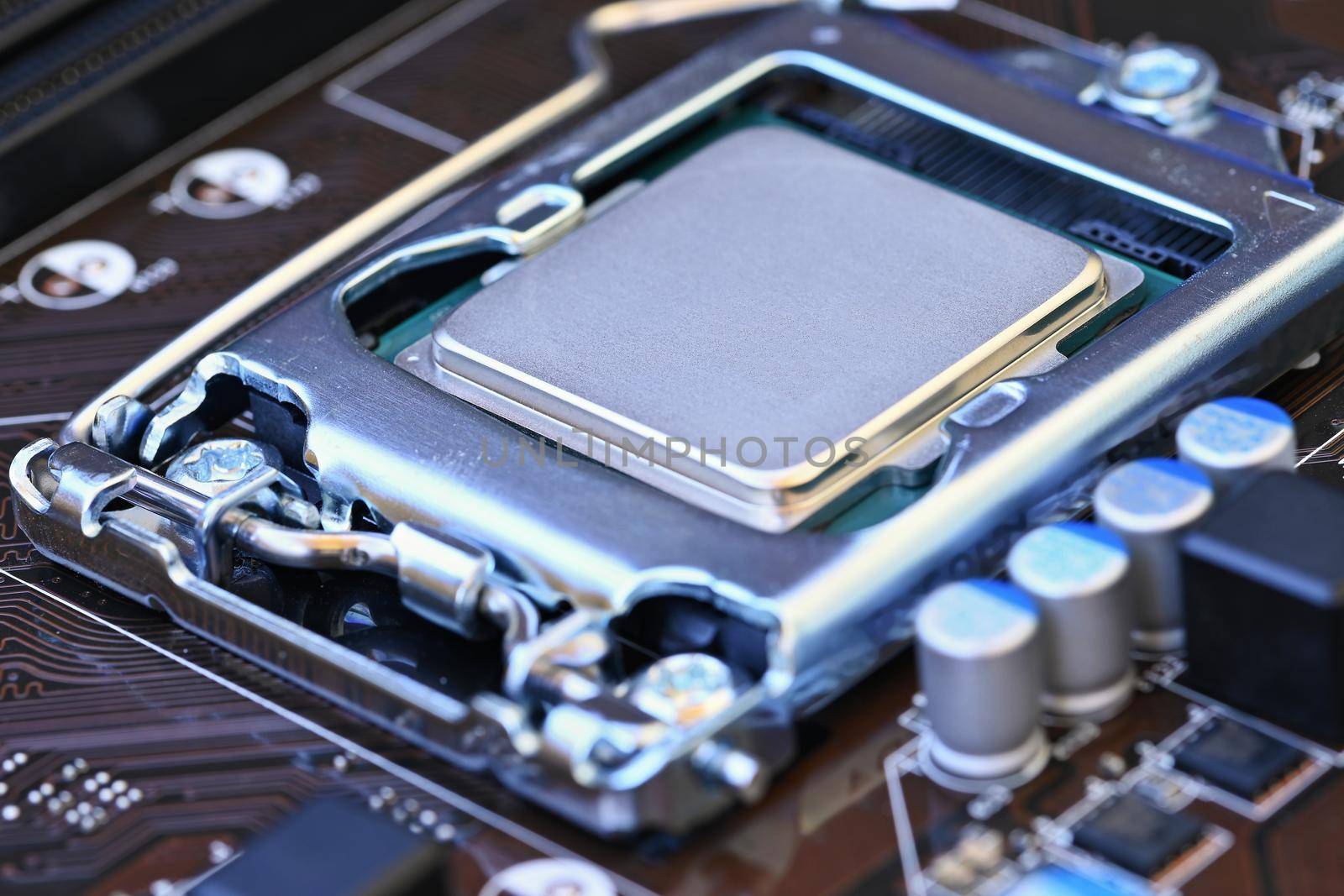 Beautiful technological photo of the processor on the motherboard. Concept for computers and internet.