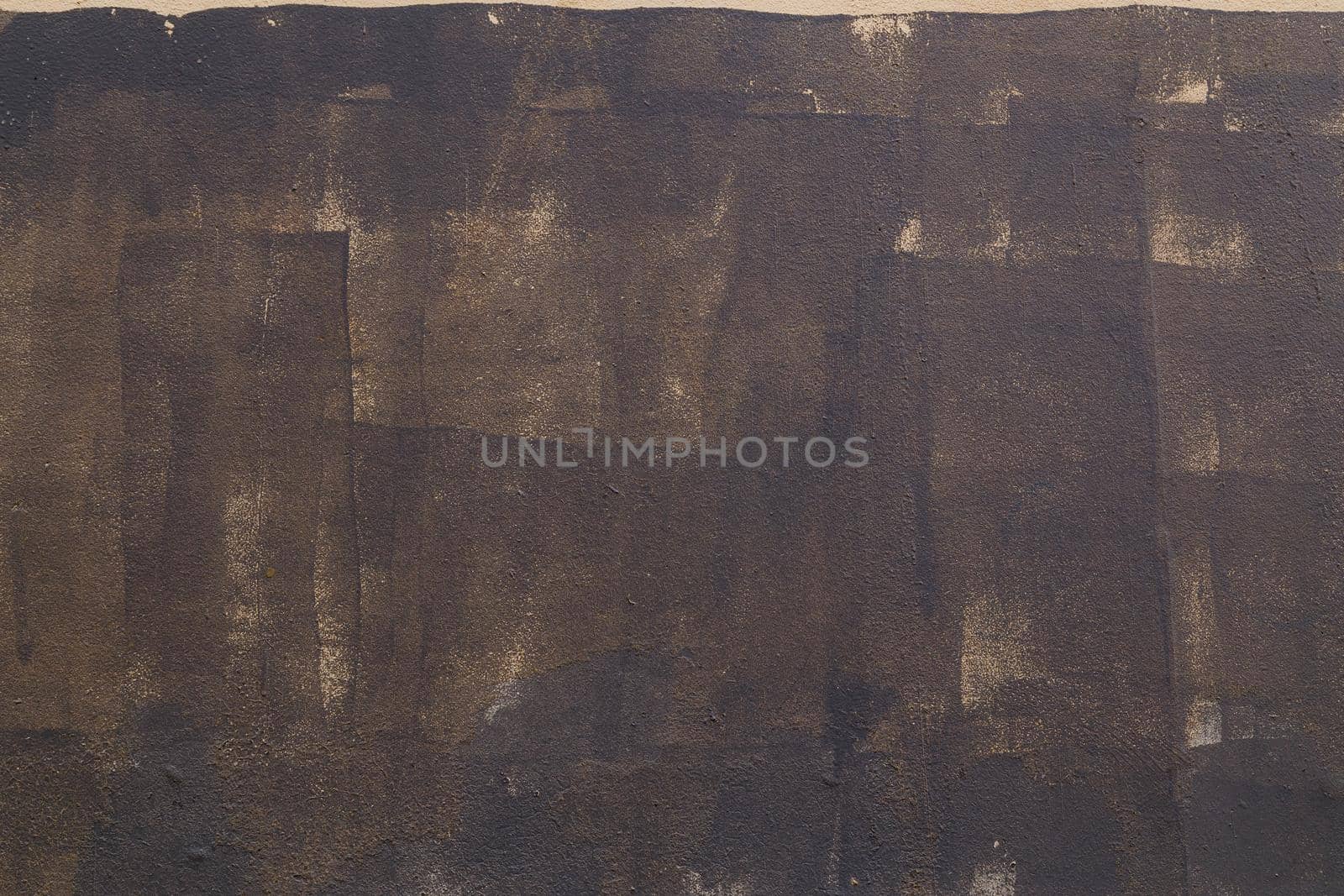 carelessly painted dark grey flat surface - texture and full frame background.
