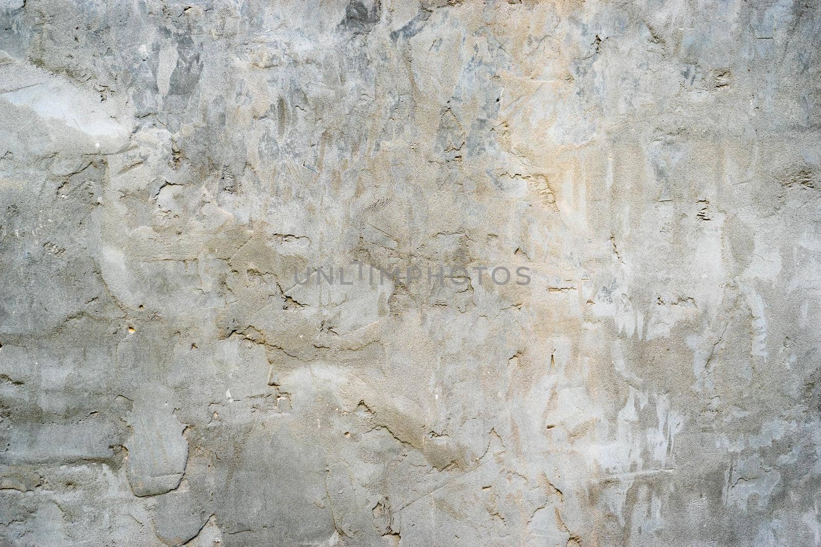 natural background from the gray plaster with a rough texture