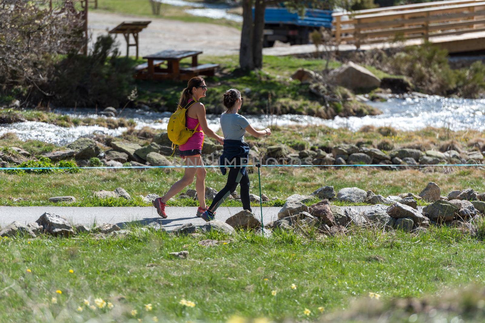 Vall de Incles, Andorra : 2021 May 07 : Two women trekking in the vall de incles in Andorra in spring 2021.