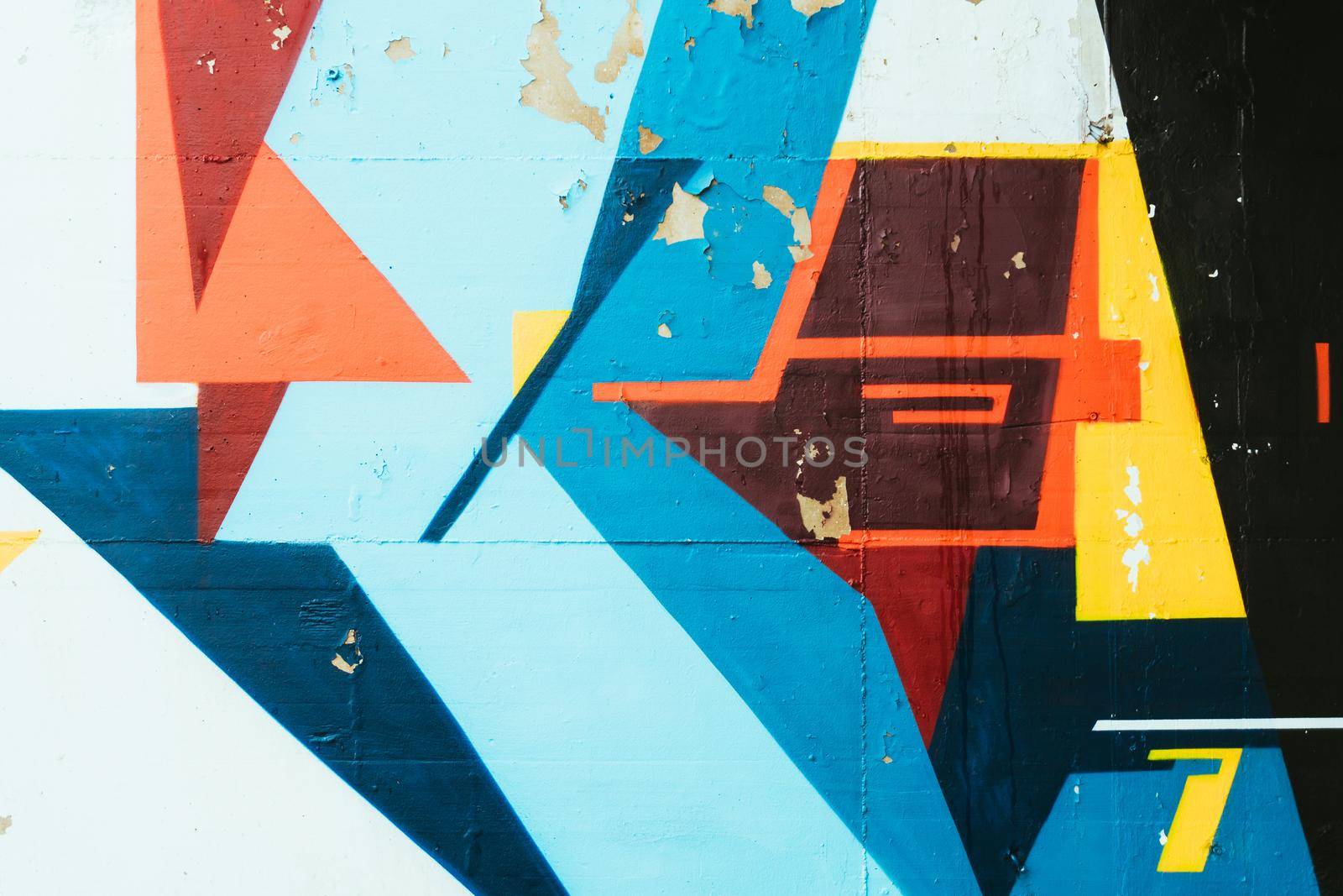 Beautiful street art graffiti. Abstract creative drawing fashion colors on the walls of the city. Urban Contemporary Culture