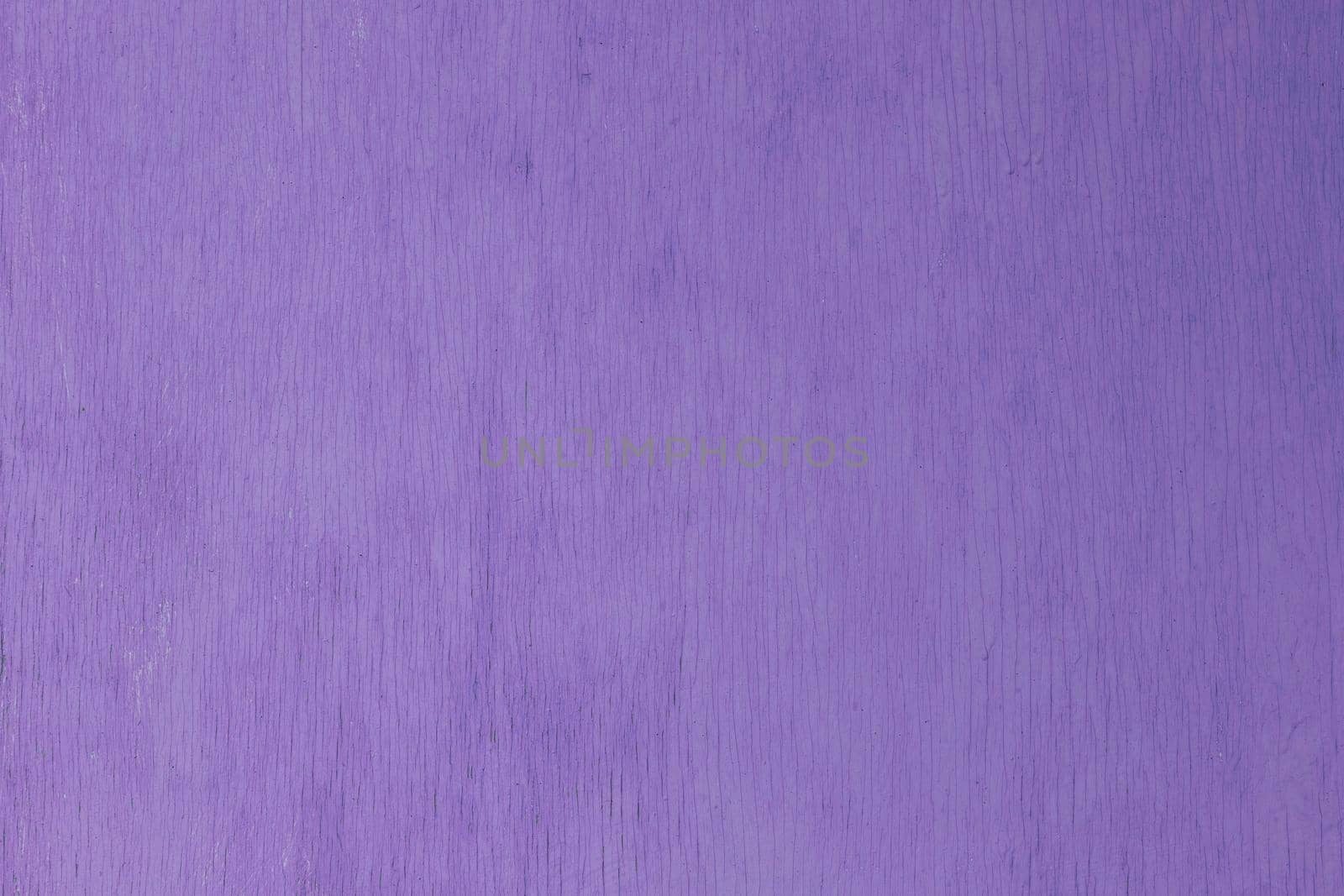 old pink painted plywood flat surface texture and background with even vertical cracks