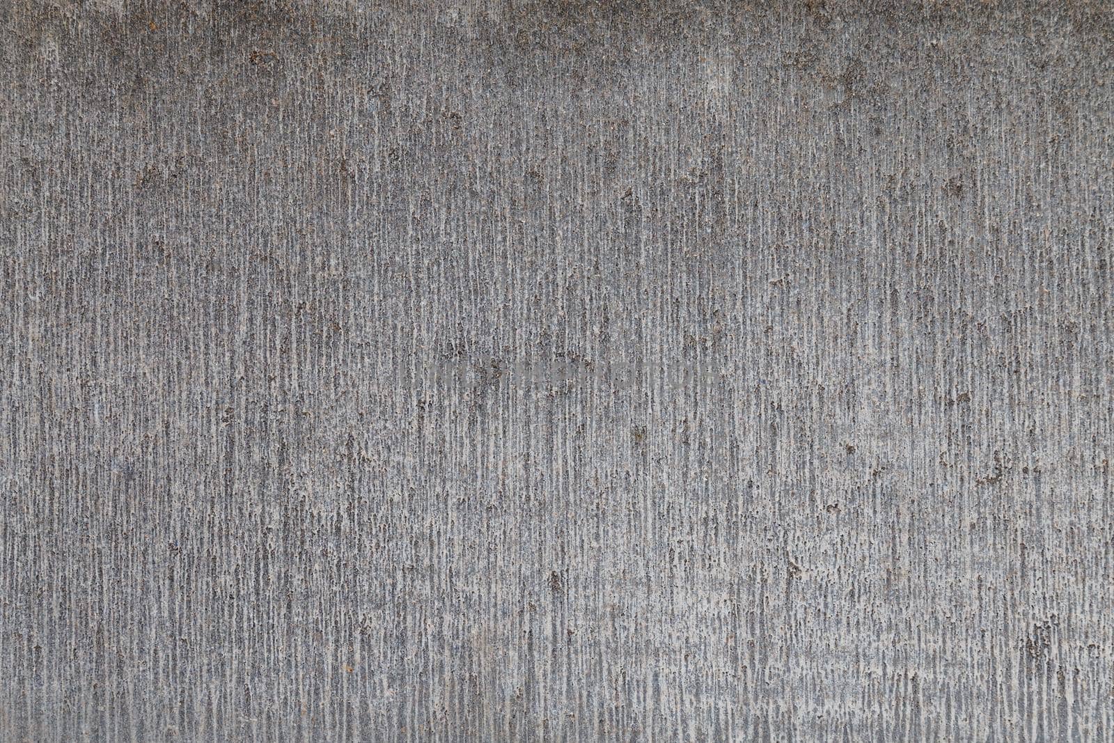 close-up flat concrete texture and background with vertical stripes structure.