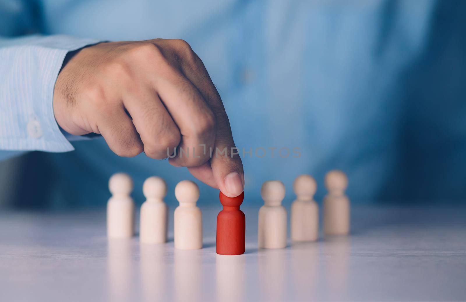 Hand of manager management human resource with recruitment and skill employee leader for corporate success, development and growth of leadership with unique, symbols of metaphor, business concept.
