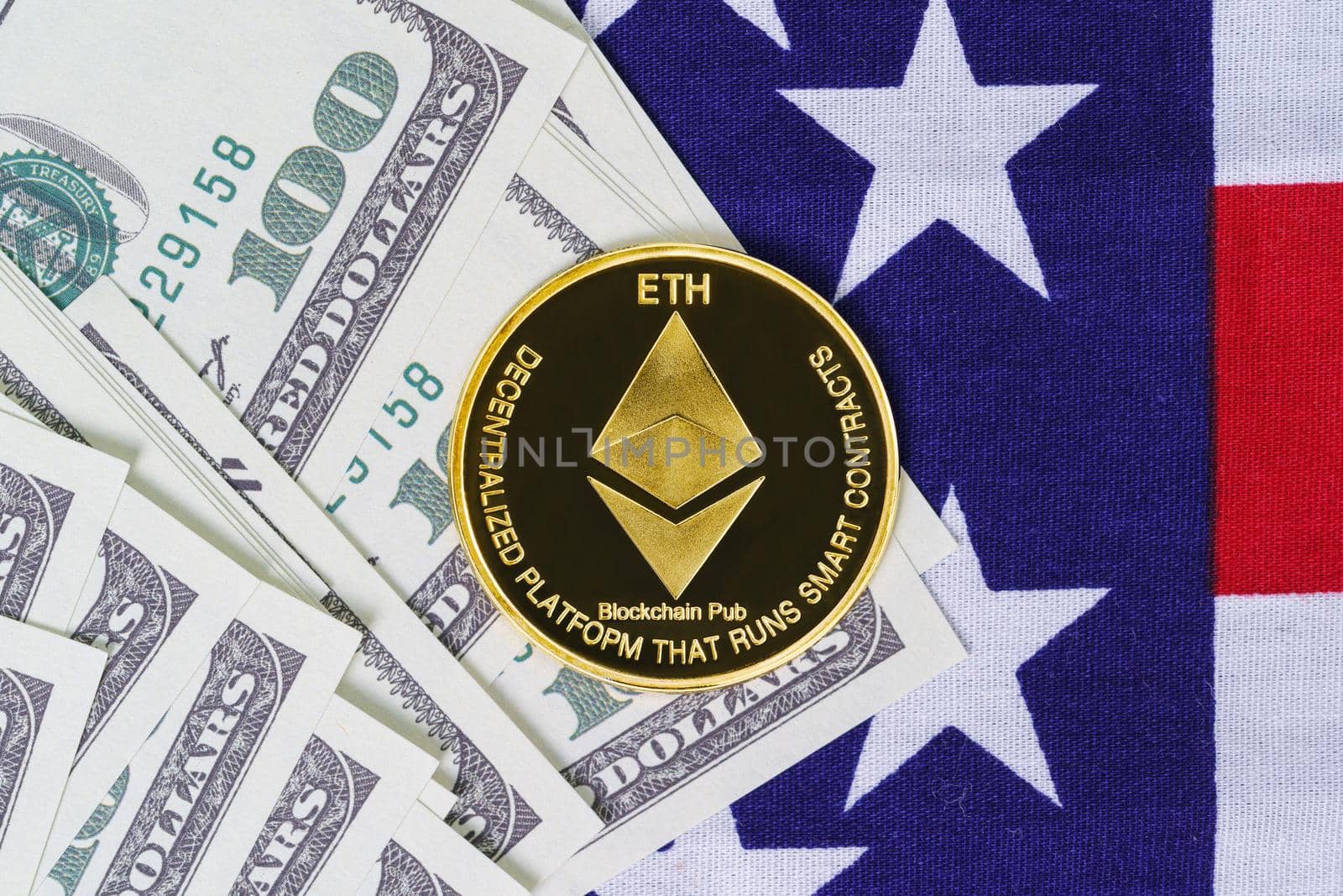 Crypto currency concept. Gold Ethereum coin and banknote on flag of United States of America USA