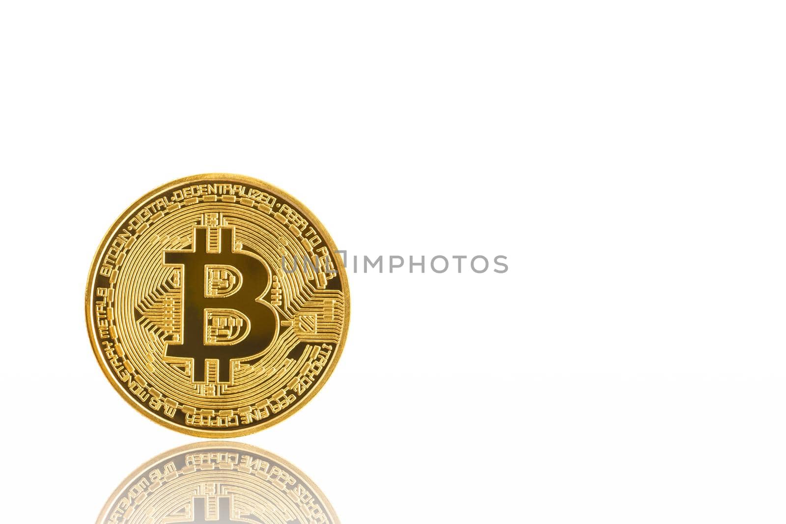 Close up golden bitcoin symbol on white background