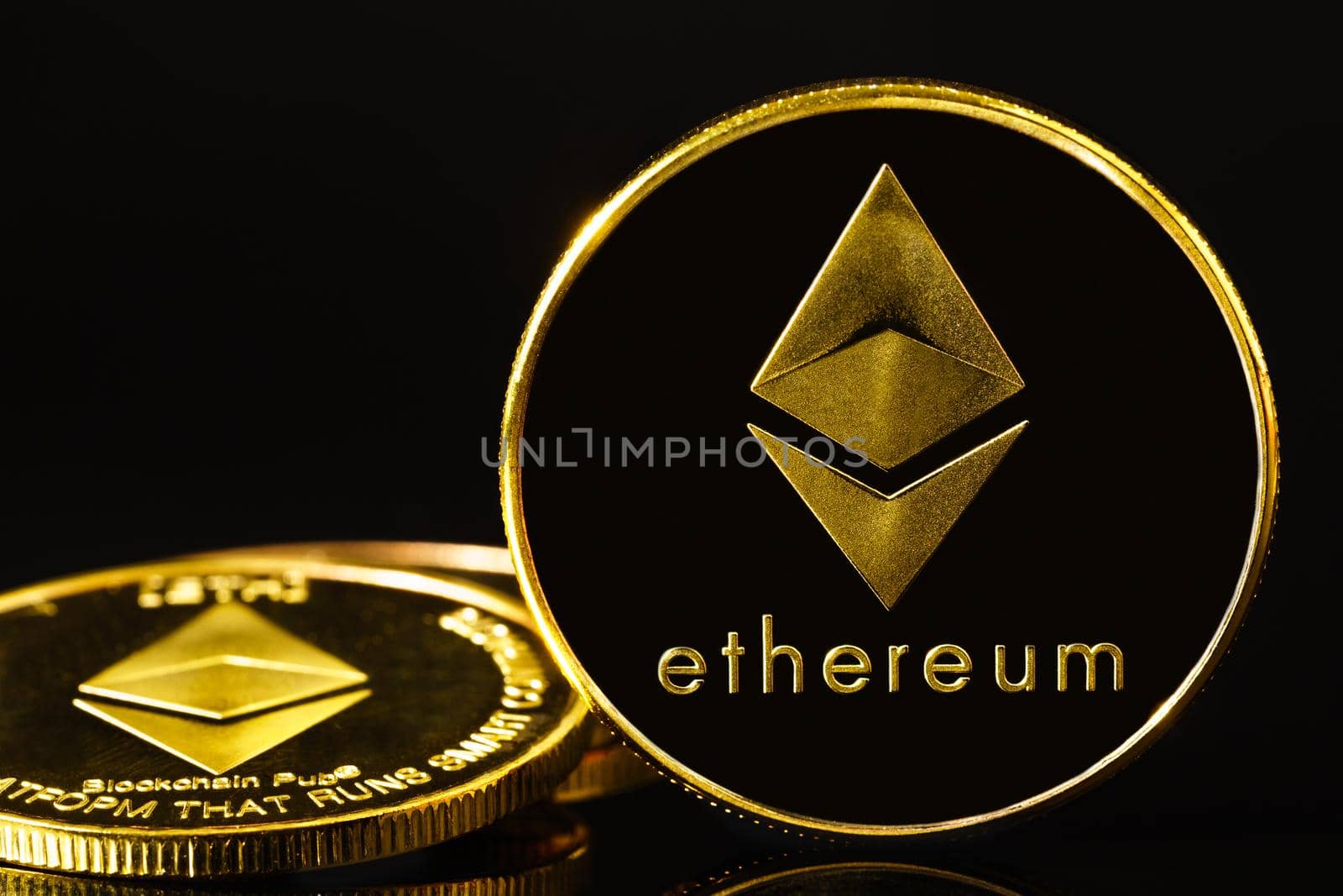 Ethereum cryptocurrency digital bit coin ETH currency concept ,Golden coin with Ethereum symbol on a black background