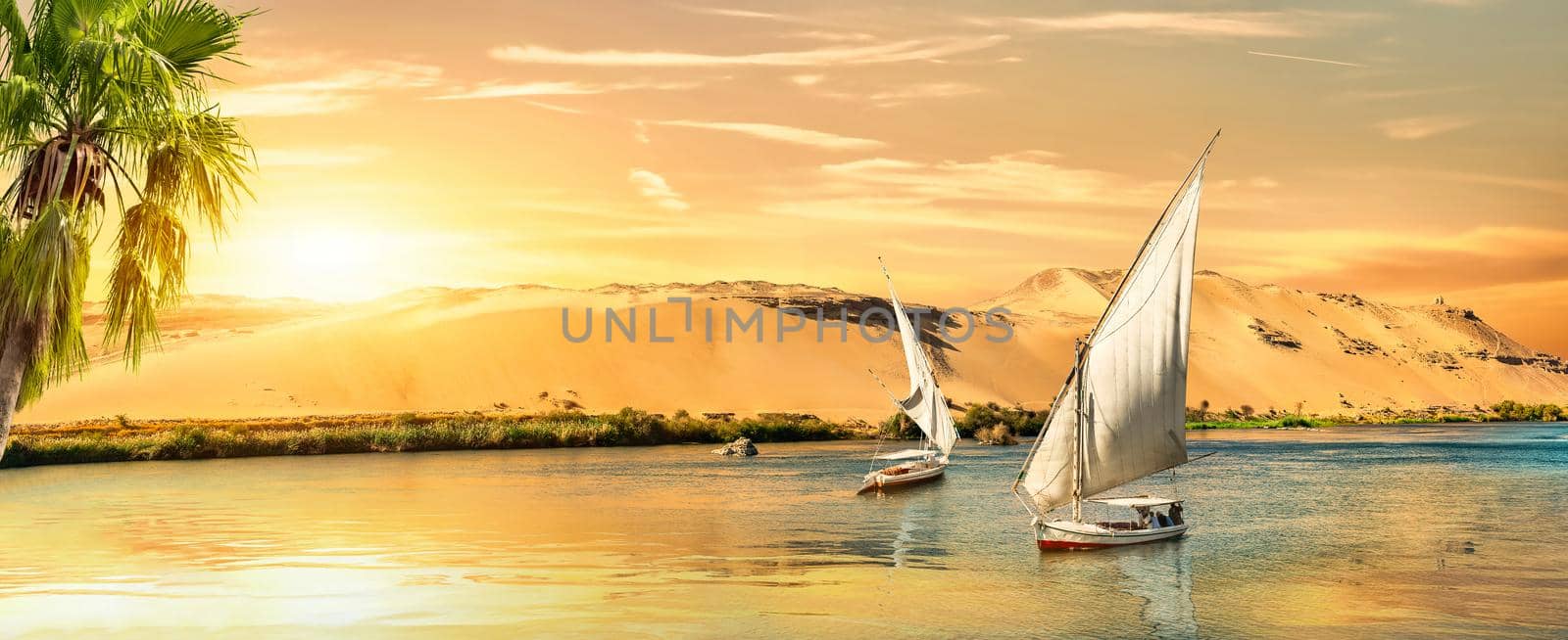 Evening sun over sailboats in Aswan, Egypt